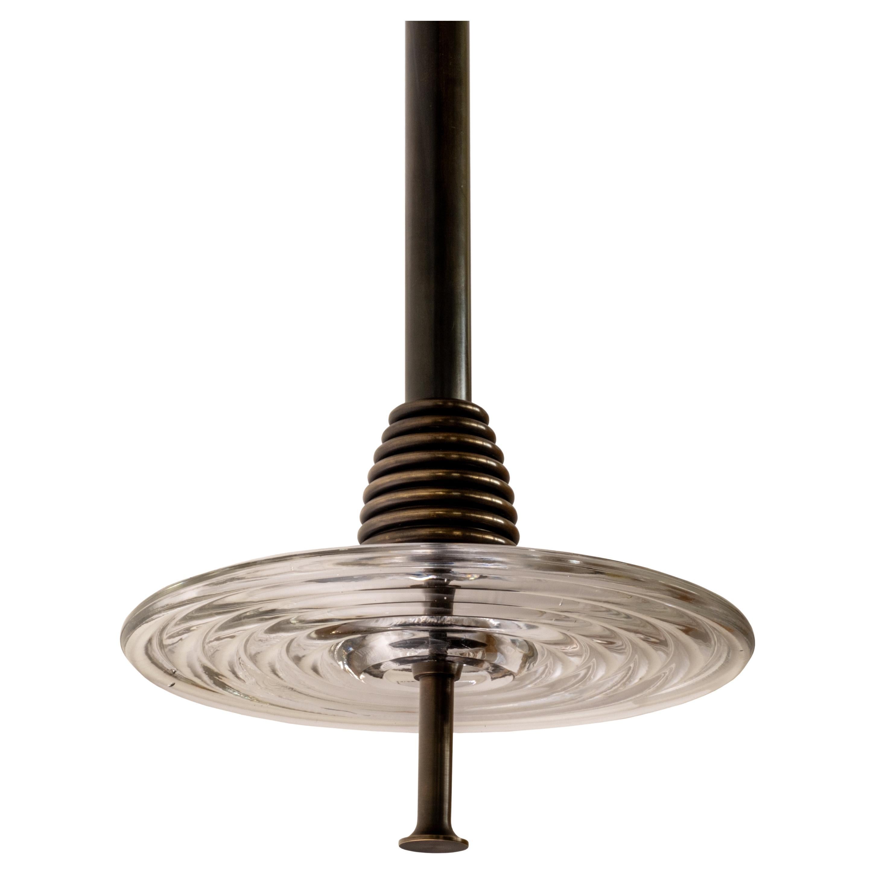 The Insulator 'D' Pendant in dark brass and clear glass by NOVOCASTRIAN