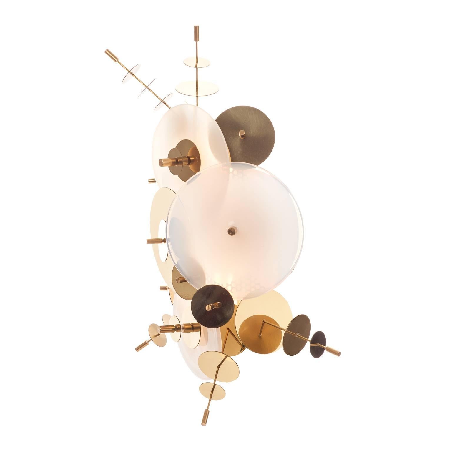 The Confetti Collection Sconce features hand blown glass discs in a variety of color palates combined with hand finished metallic disc accents.  

AVRAM RUSU STUDIO is a Brooklyn based design studio known for impeccably crafted and distinctly