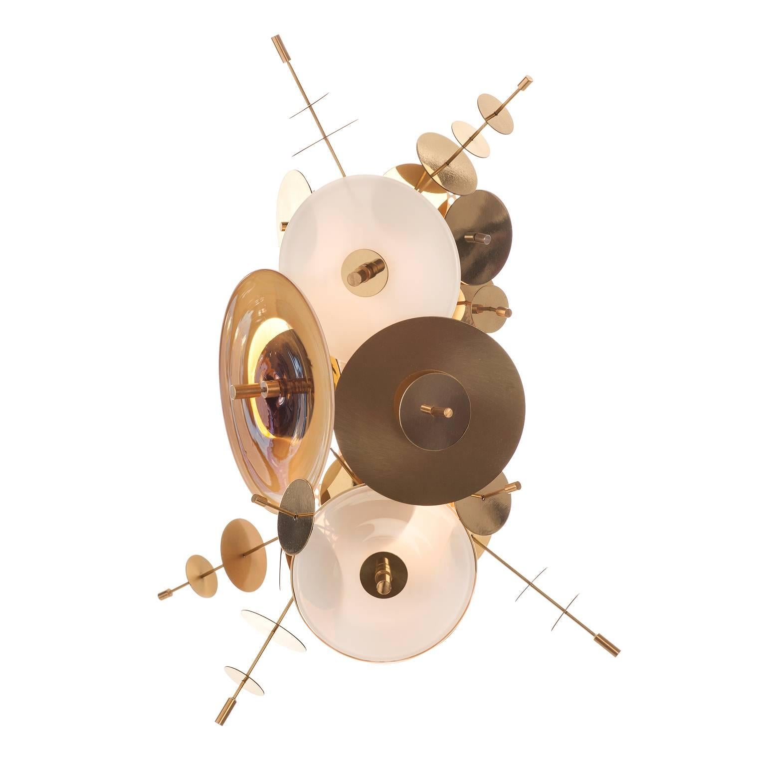 The Confetti Collection Sconce features hand blown glass discs in a variety of color palates combined with hand finished metallic disc accents.  

AVRAM RUSU STUDIO is a Brooklyn based design studio known for impeccably crafted and distinctly