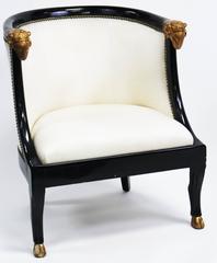 Pair of Neoclassic Black Lacquer and Gilt Rams Head Barrel Back Chairs