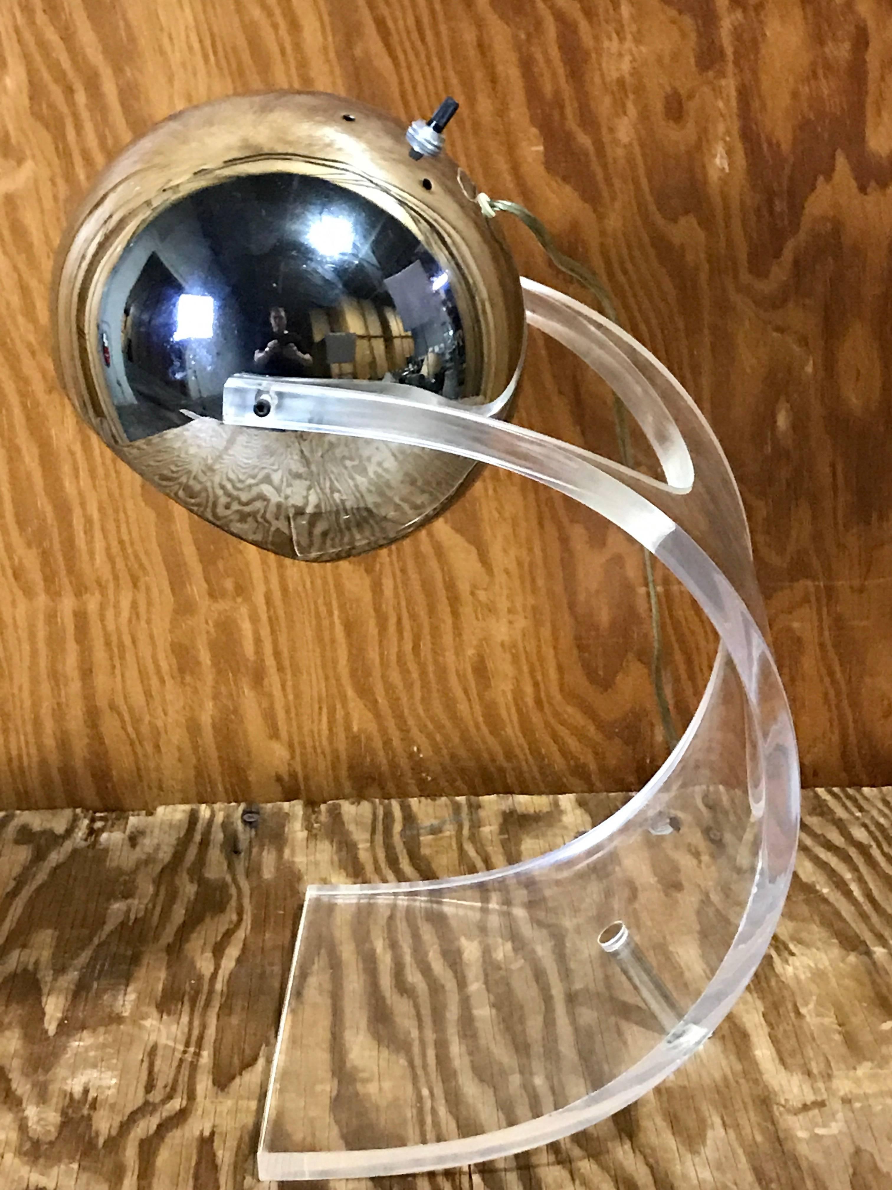 Mid-Century Lucite and chrome cantilever desk lamp, by Robert Sonneman, with bright 6" chrome ball supported with curved Lucite and chrome base.
This item is at our Atlanta GA, Location, not Palm Beach.
