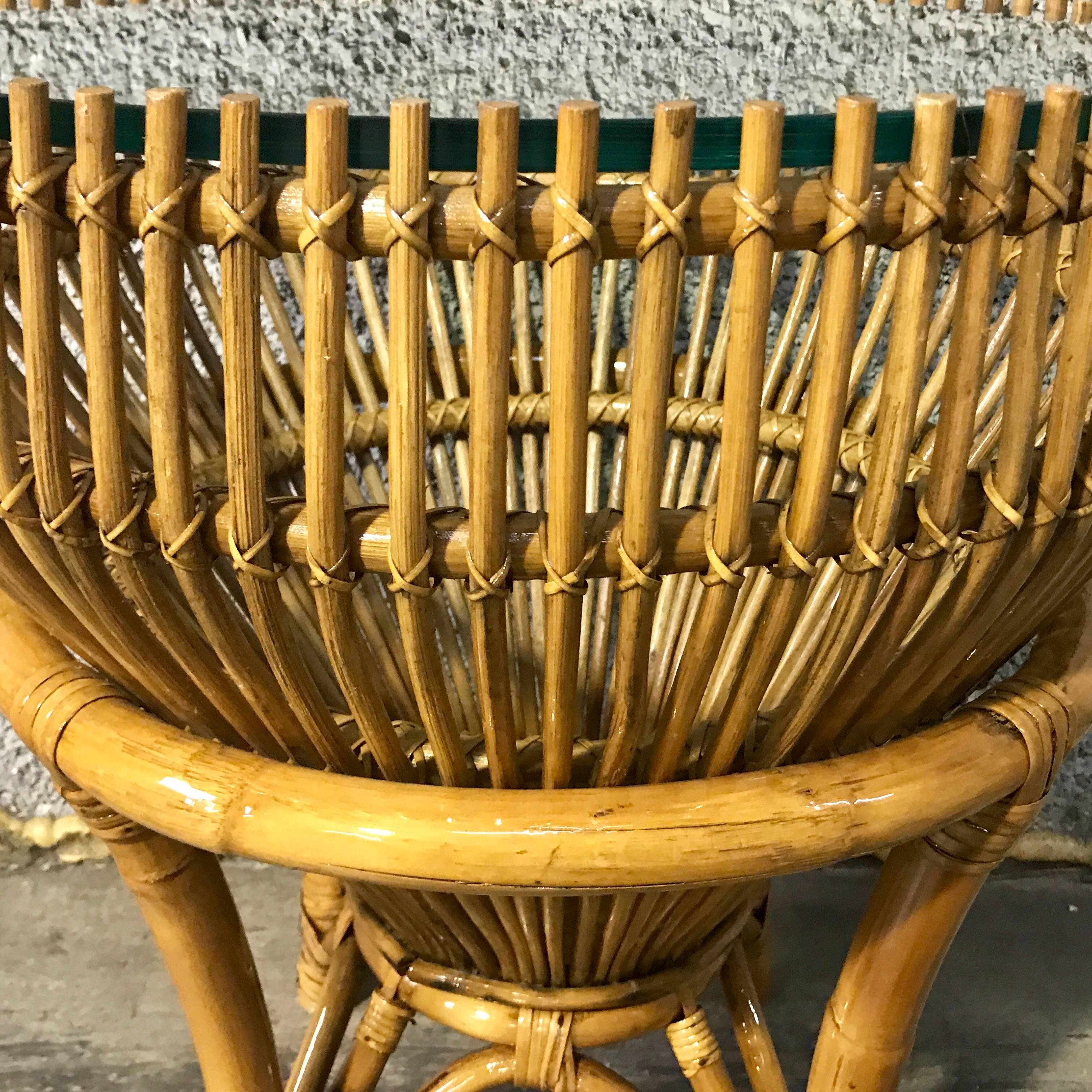in the style of Franco Albini "Fish Trap" table, restored, beautifully made, with new 19.5" inset glass top, on the two-piece woven base. Professionally restored finish, no breaks. The top "Trap" measures 21" D x