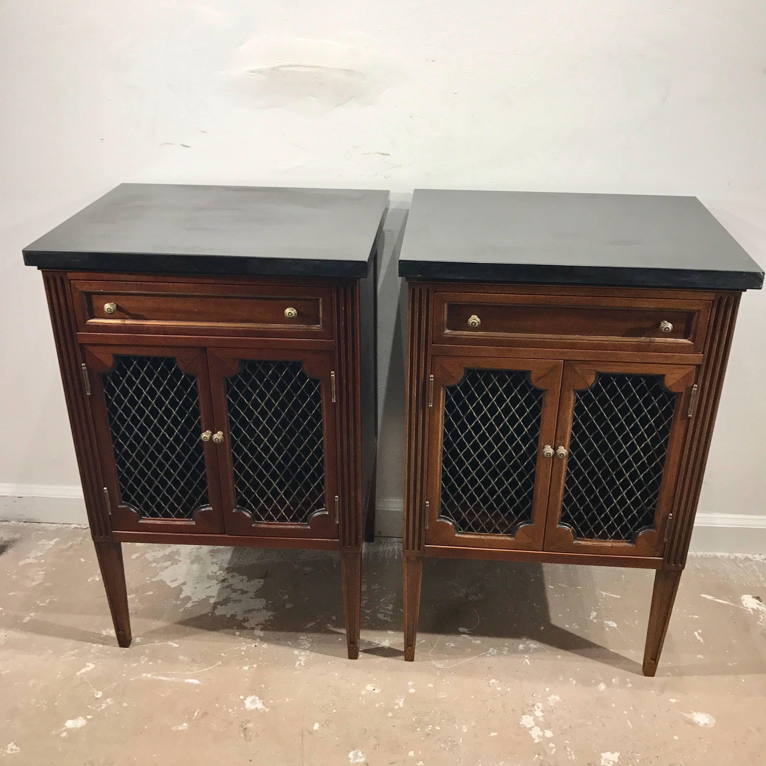 Pair of marble-top Directoire brass-mounted end tables or nightstands, each one with 1-inch thick black marble top resting on a lower case fitted with a 14