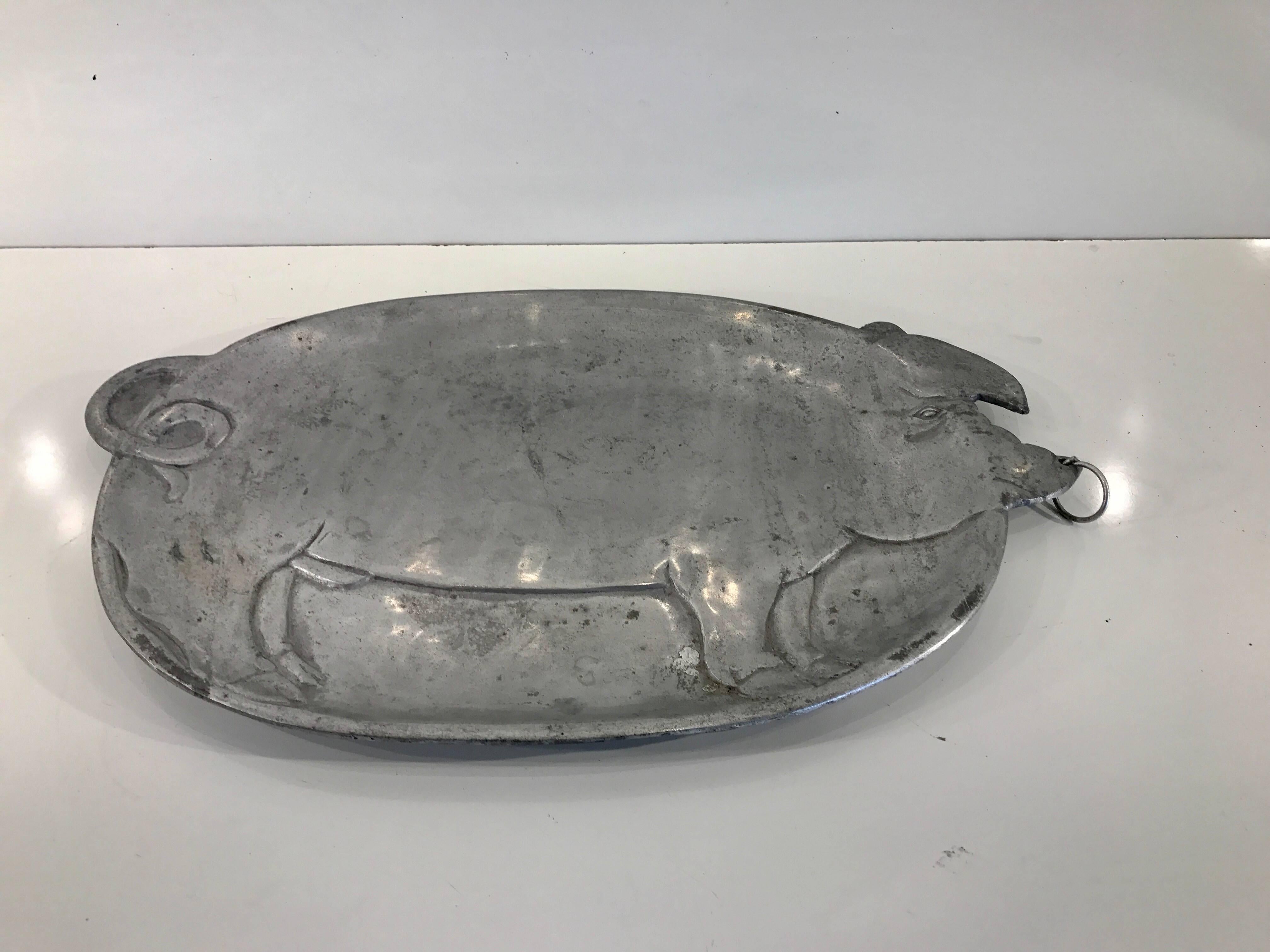 Antique French Pewter Pig Motif Platter, realistically cast, beautiful muted patina, complete with nose ring to hang. Unmarked.
This item is at our Atlanta GA, Location, not Palm Beach.
