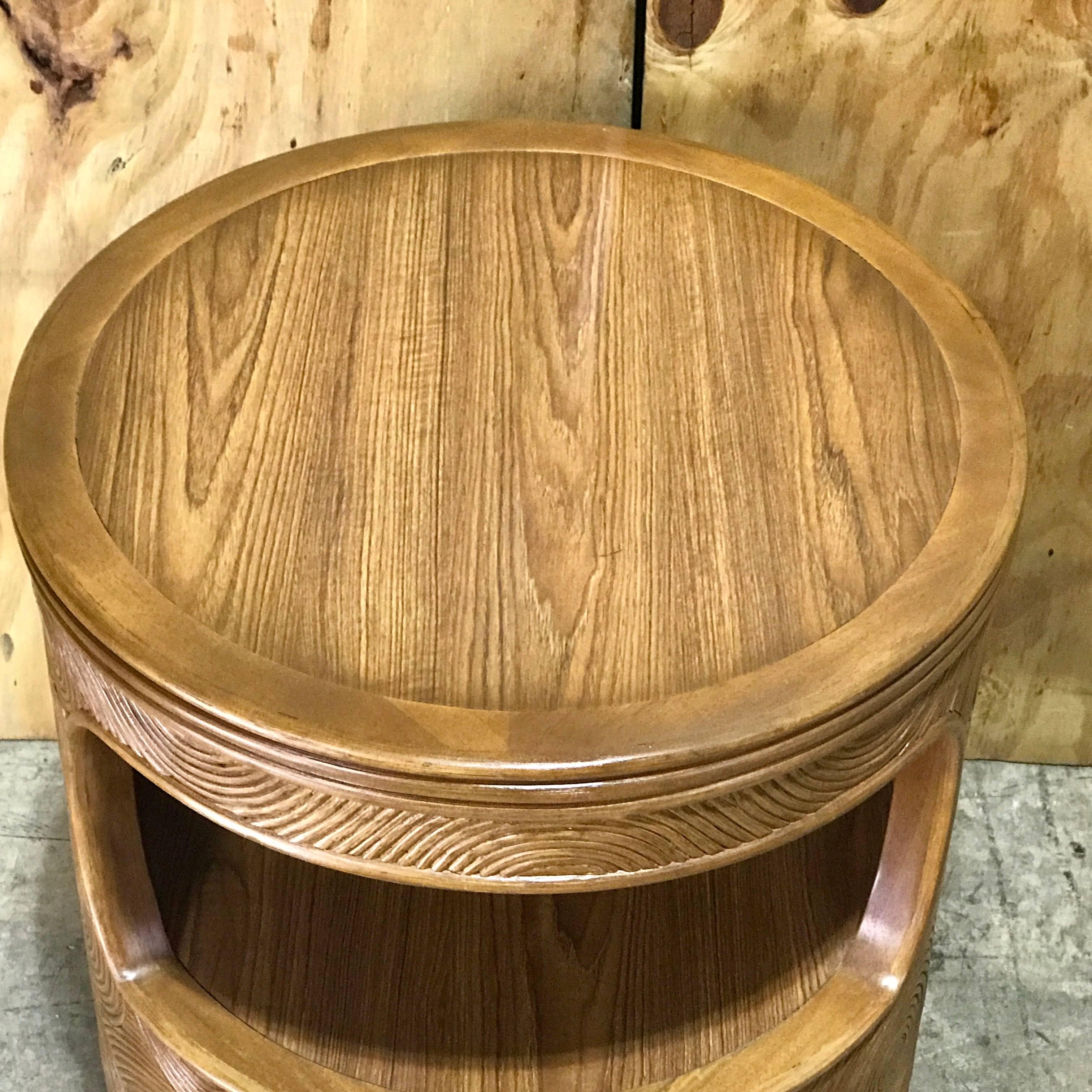 Pair of Mod bamboo and reed round end tables, in the manner of Gabriella Crespi, with lacquered tops and a second open interior shelf that measures 20" x 15".