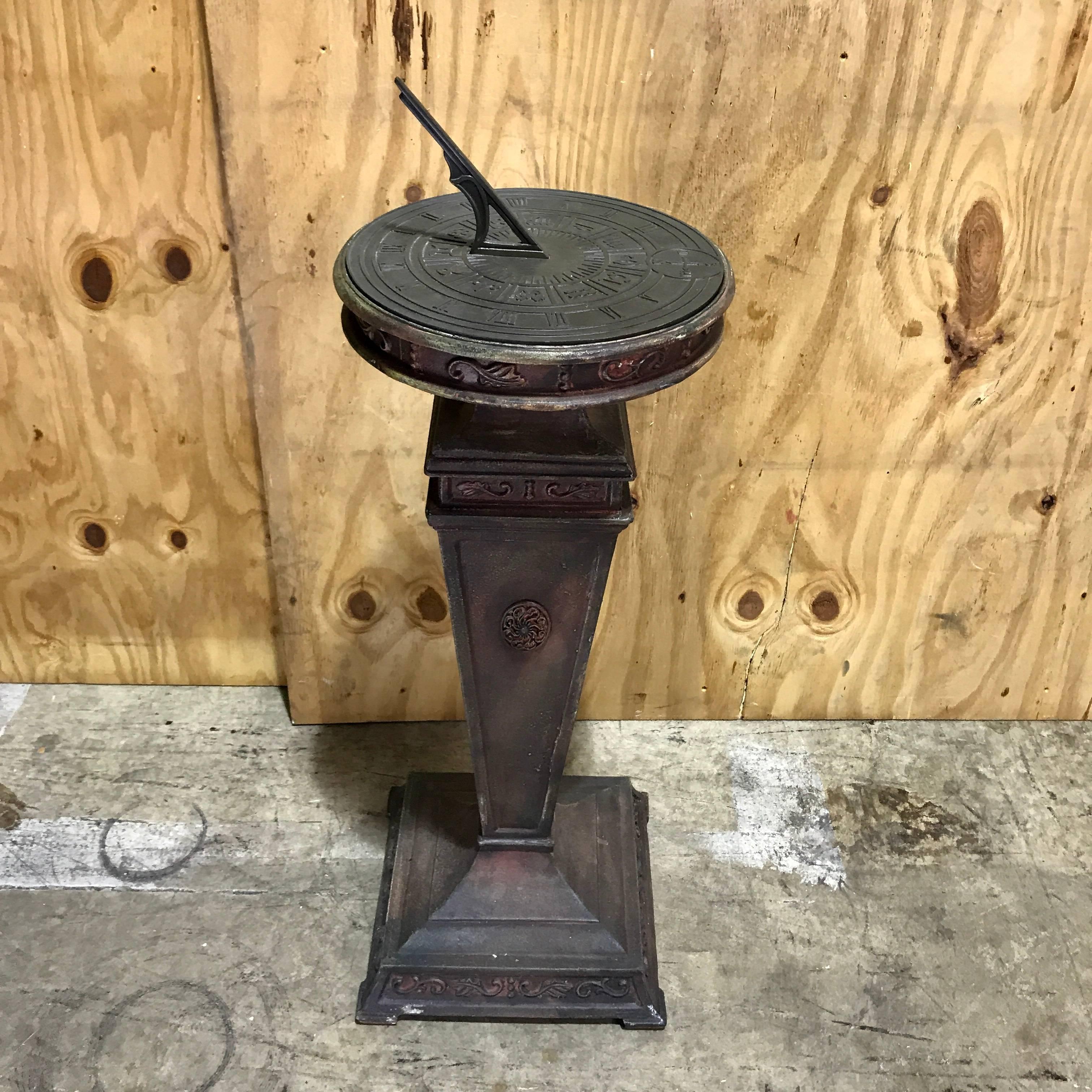 cast iron sundial on stand