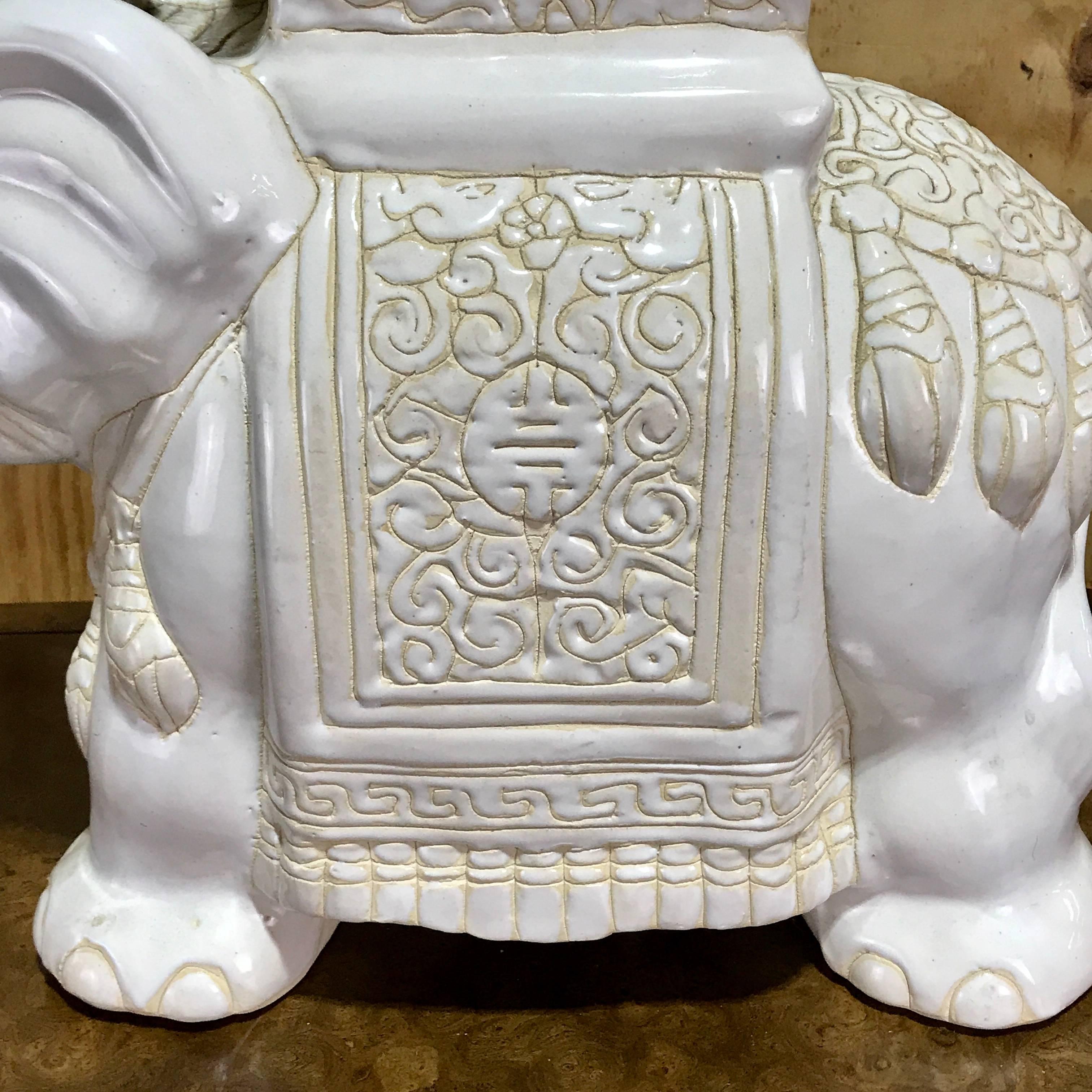 Midcentury porcelain standing elephant garden seat, in white and yellow. Standing 21