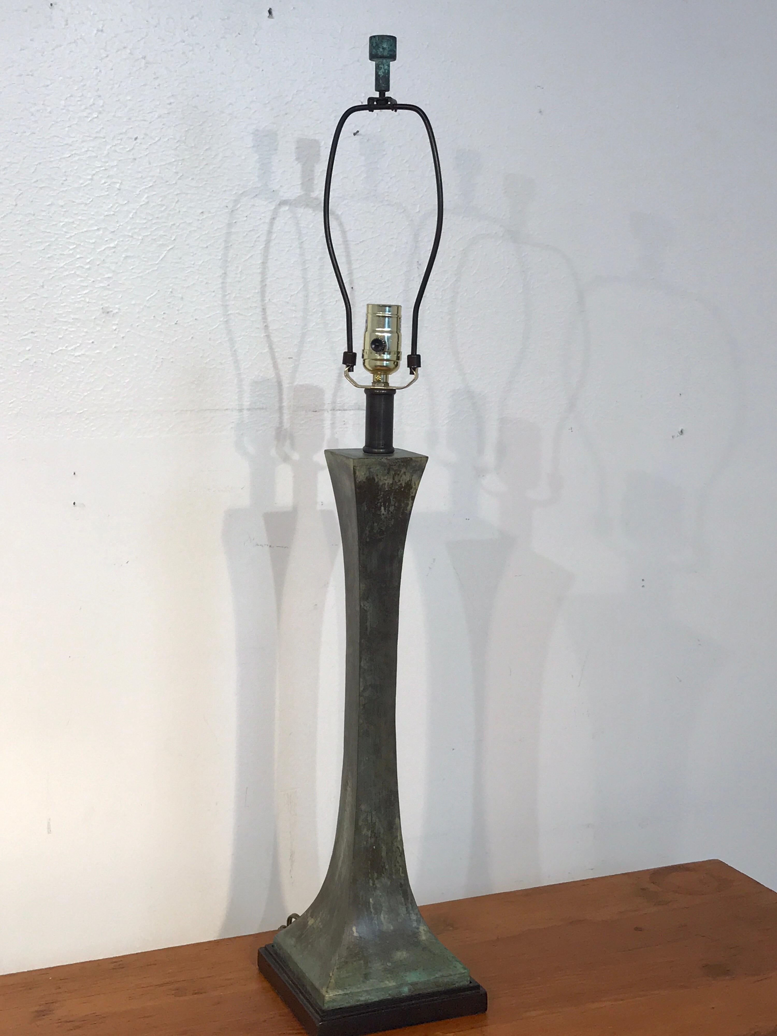 Verdigris patinated bronze table lamp by S. R. James for Hansen, complete with verdigris lamp finial, raised on a patinated bronze conforming base. Newly wired.
25