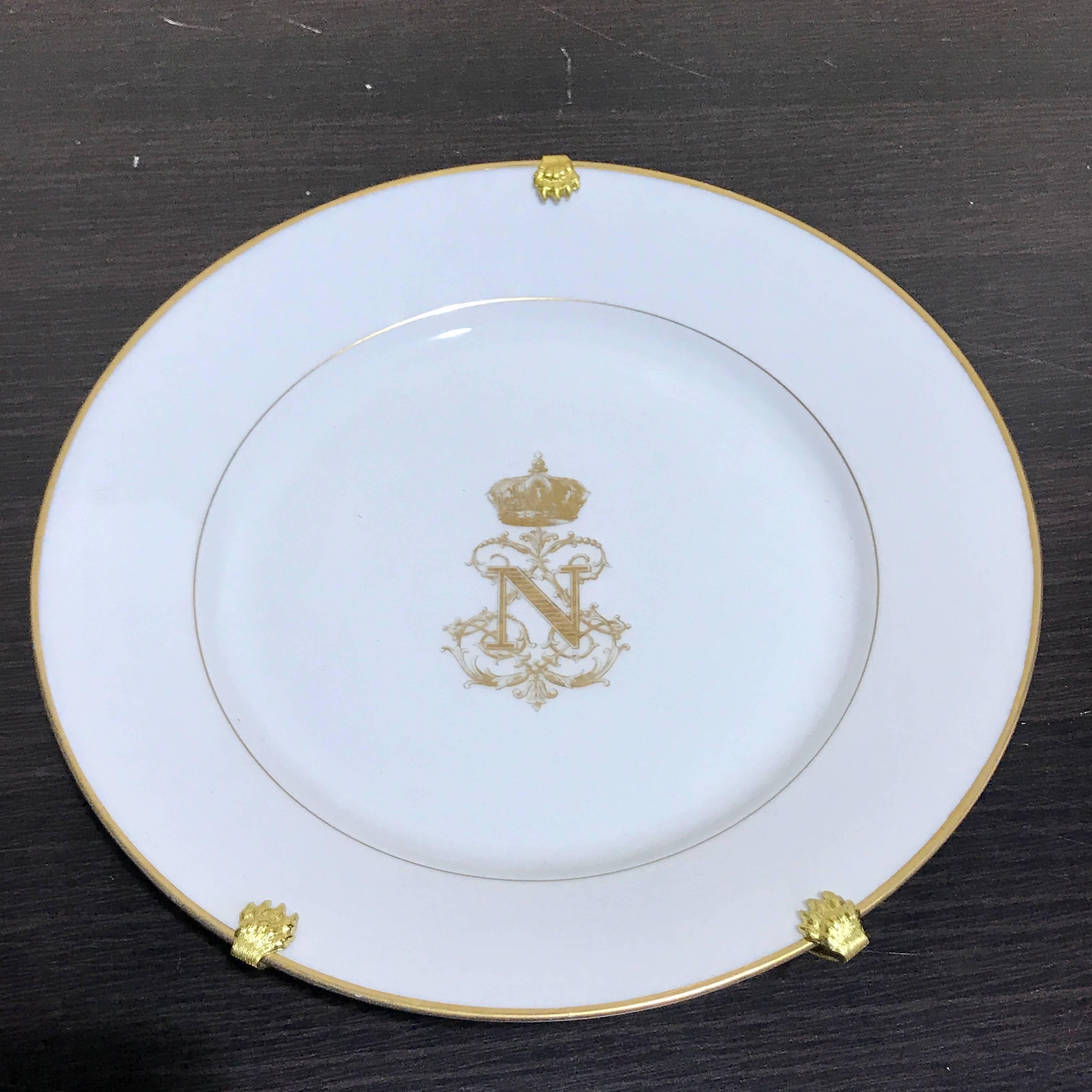 A plate from the service of Napoleon III, French Emperor from 1852-1870.
Manufacture Nationale de Sèvres, Each plate bears the Royal Cypher of Napoleon, N surmounted by the Imperial Crown.
The plate has the date of manufacture of the blank, 1857,