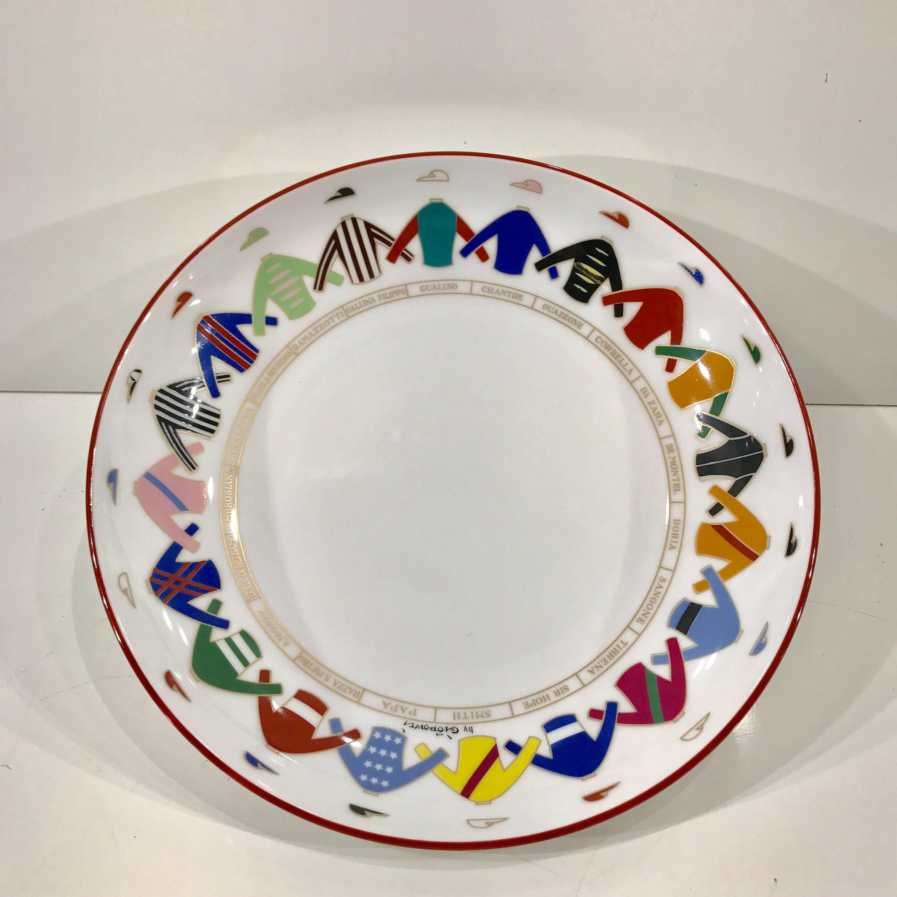 Pair of Gio Ponti jockey motif plates/shallow bowl for Richard Ginori, decorated with a continuous border of 20 different Jockey silks and uniforms.





 