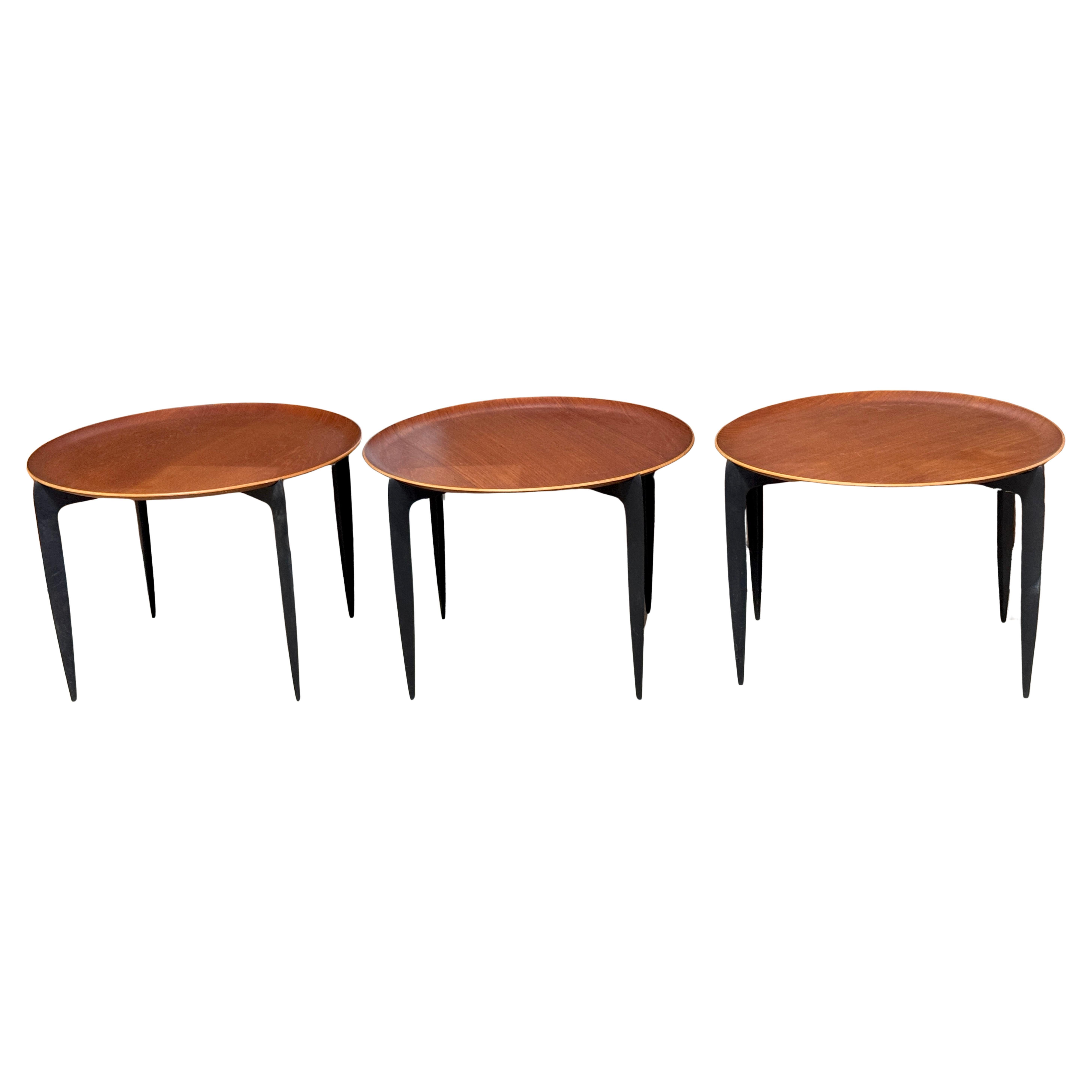 Danish Teak & Ebonized Circular Campaign Tray Tables by Fritz Hansen  Denmark, 1960s, Sold Individually 

This is a rare opportunity to acquire up to three iconic Danish Teak & Ebonized Circular Campaign Tray Tables by Fritz Hansen, Denmark, 1960s.
