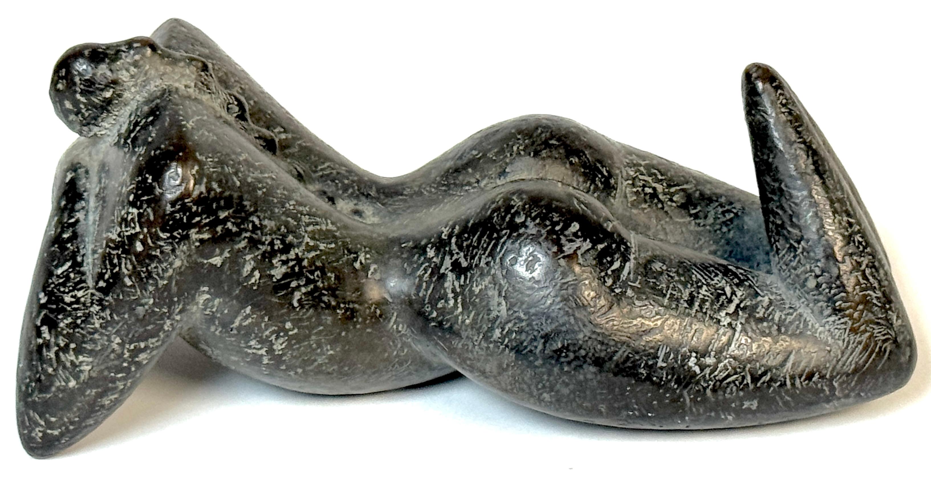 “Liggend (Reclining)” by Kyle Smith, Bronze Nude with Ponytail, Edition 2 of 9, 1999

Signed, Dated, and Numbered
Dimensions: 7” W × 3.5” D × 3.5” H
Patina: Dark Engraved Verdigris

A sensuous and introspective cast bronze by contemporary sculptor