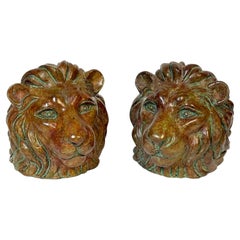Pair of Regal Bronze Lion Head Bookends with Verdigris Patinated Highlights