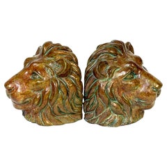 Pair of Regal Bronze Lion Head Bookends with Verdigris Patinated Highlights
