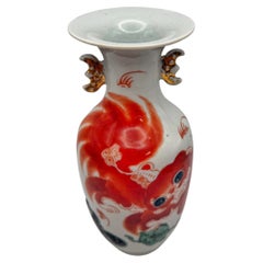 Chinese Porcelain Guardian Lion Vase with Calligraphy and Gilt Bat Handles