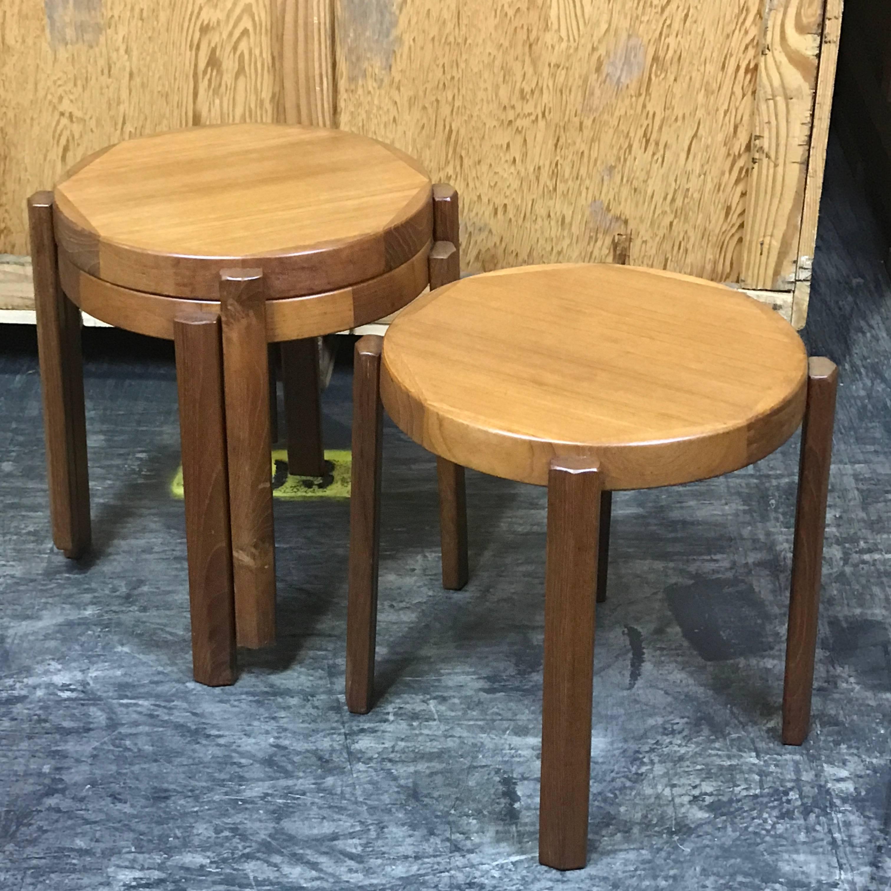Great set of chunky Danish Modern stacking circular tables or stools, Each one with inlaid tops and "Lug" column legs. As a set of three stacked tables the group measures 20.5" high. Each table has a 1.75-inch edge. Each individual