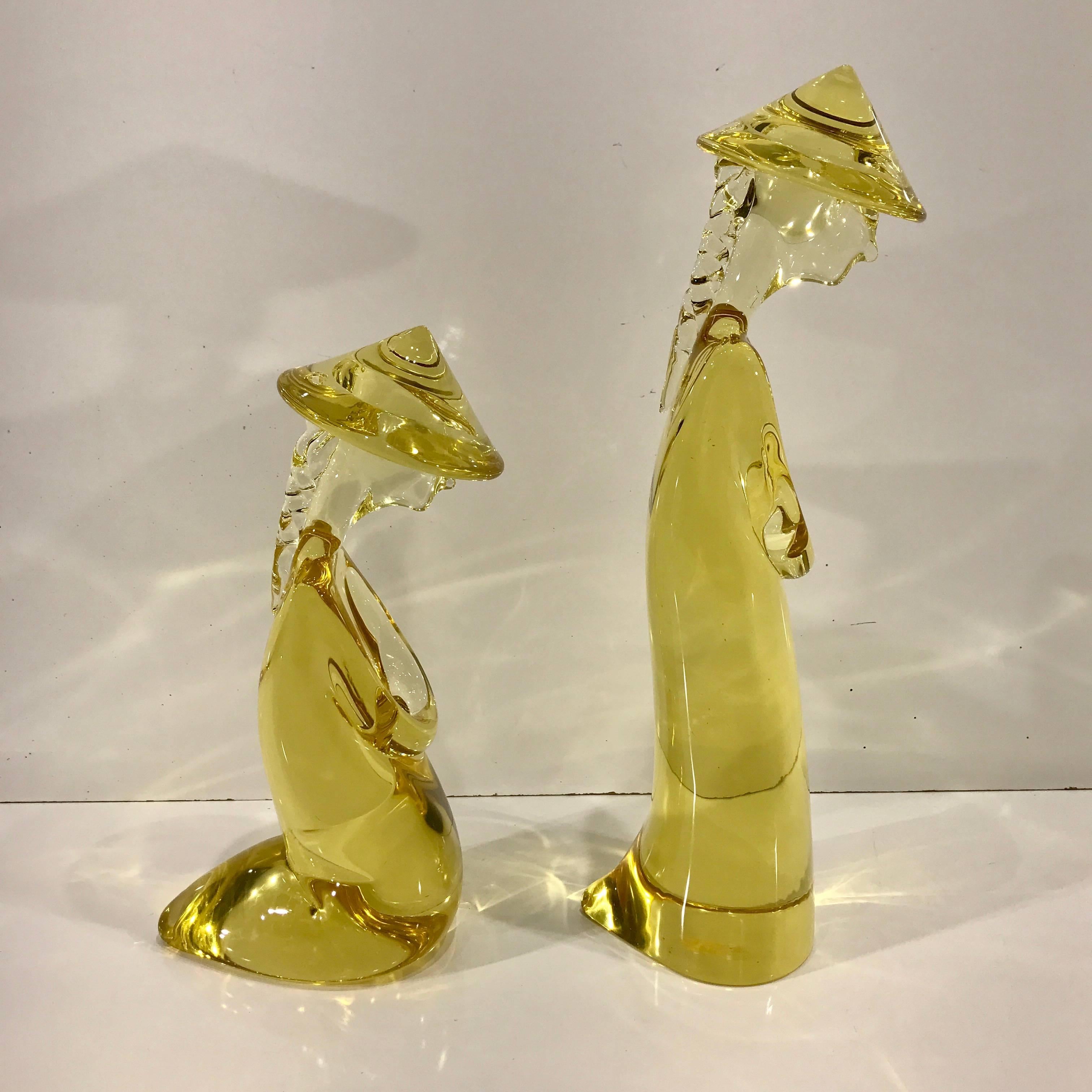 A pair of Murano glass Chinese figures, attributed to Pino Signoretto, Each one in a rare color of a yellow diamond. One standing, and one kneeling, both have subtle details as hats, pig tails, folded arms. Not marked, residue of a vintage Murano