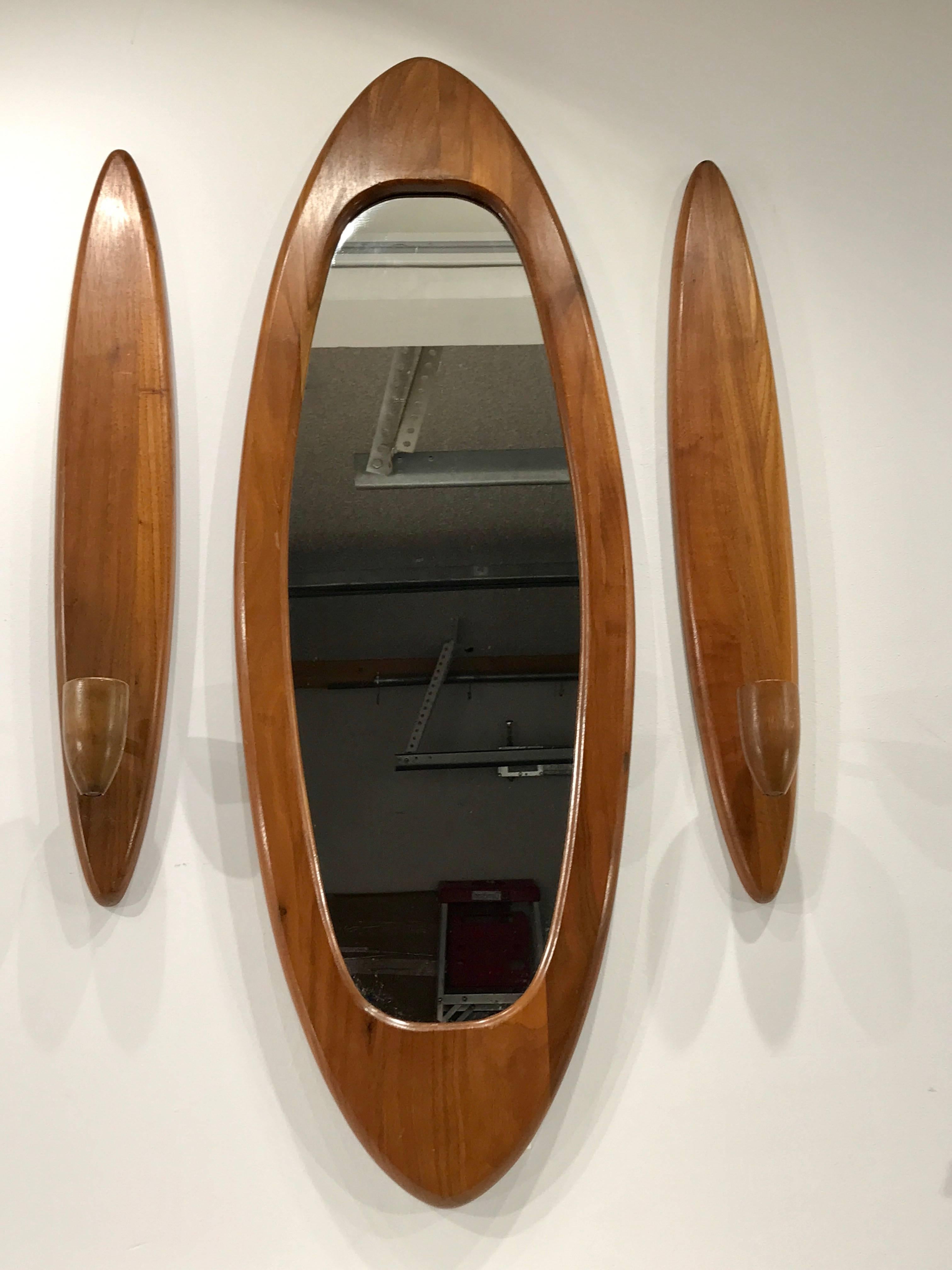 Danish modern teak surfboard three-piece mirror garniture, consisting of two 23.5