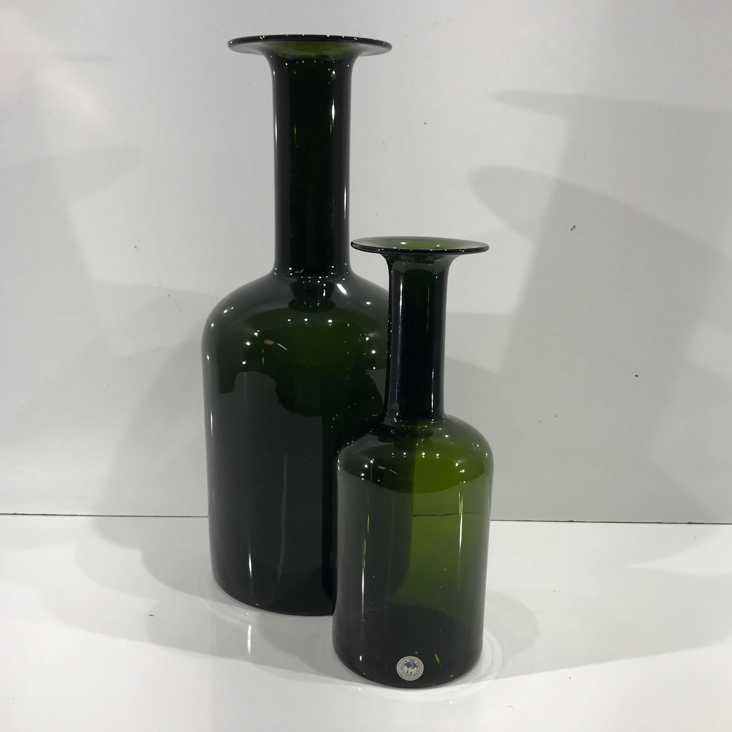A pair of Holmegaard Gulvvases vase by Otto Brauer, in olive. The taller one standing measures 15