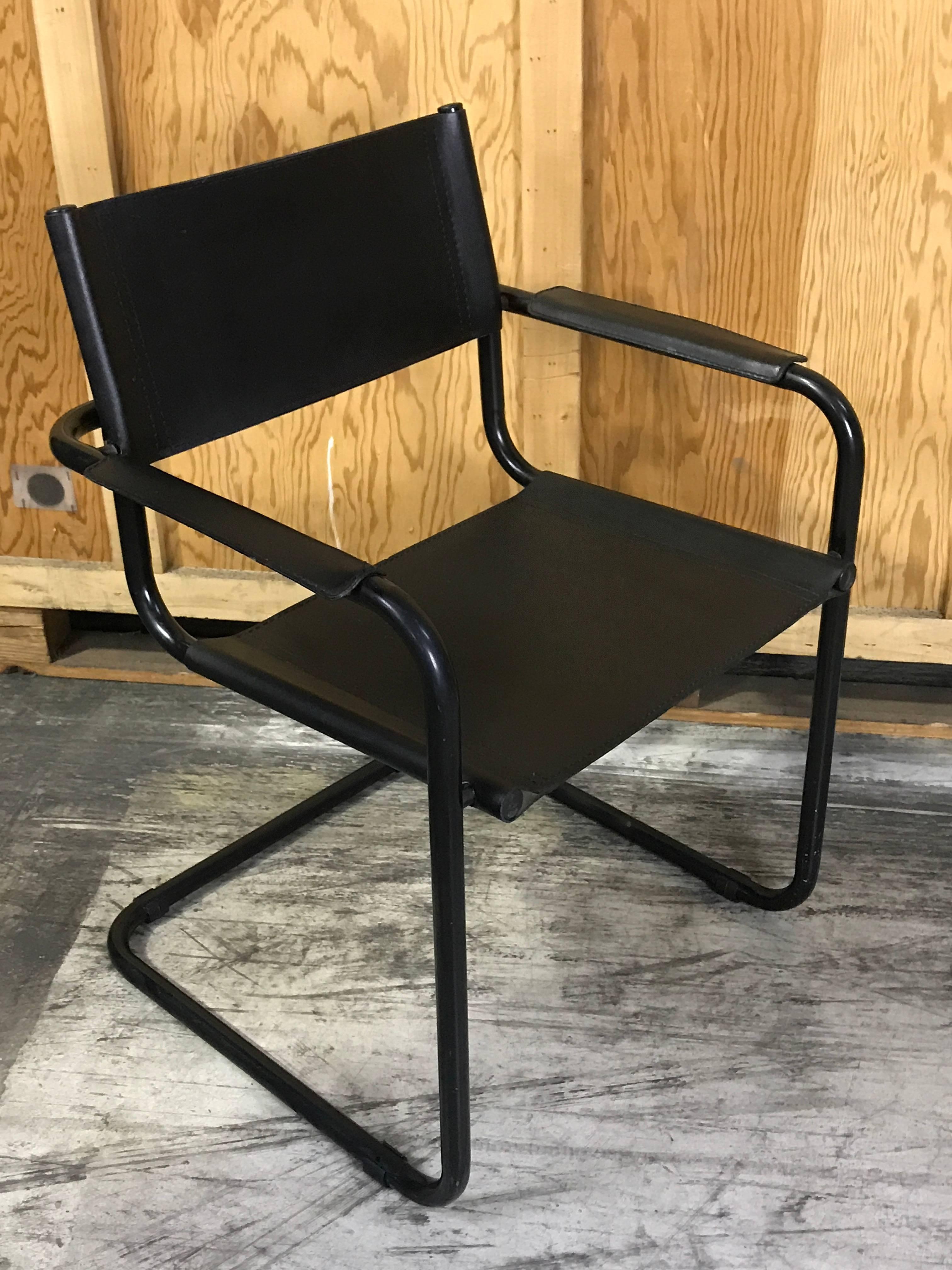 FOUR leather and blackened chrome armchairs by Mart Stam for Fasem
Measures: The height of the arm is 24.5" high.
THIS IS FOR FOUR CHAIRS, NOT THE SIX AS PICTURED 
