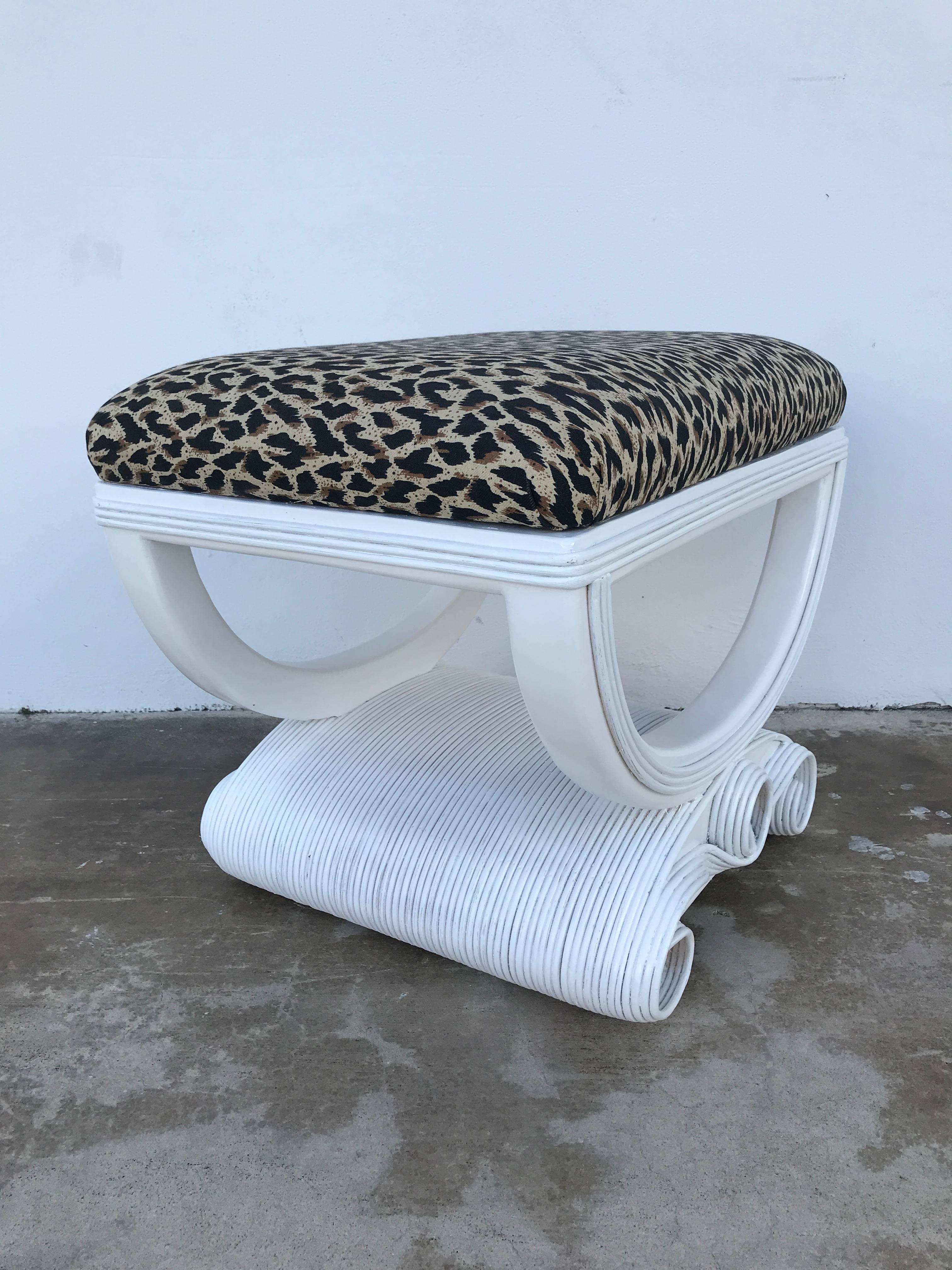 White lacquered Rattan Bench,  upholstered in useable vintage leopard upholstery.