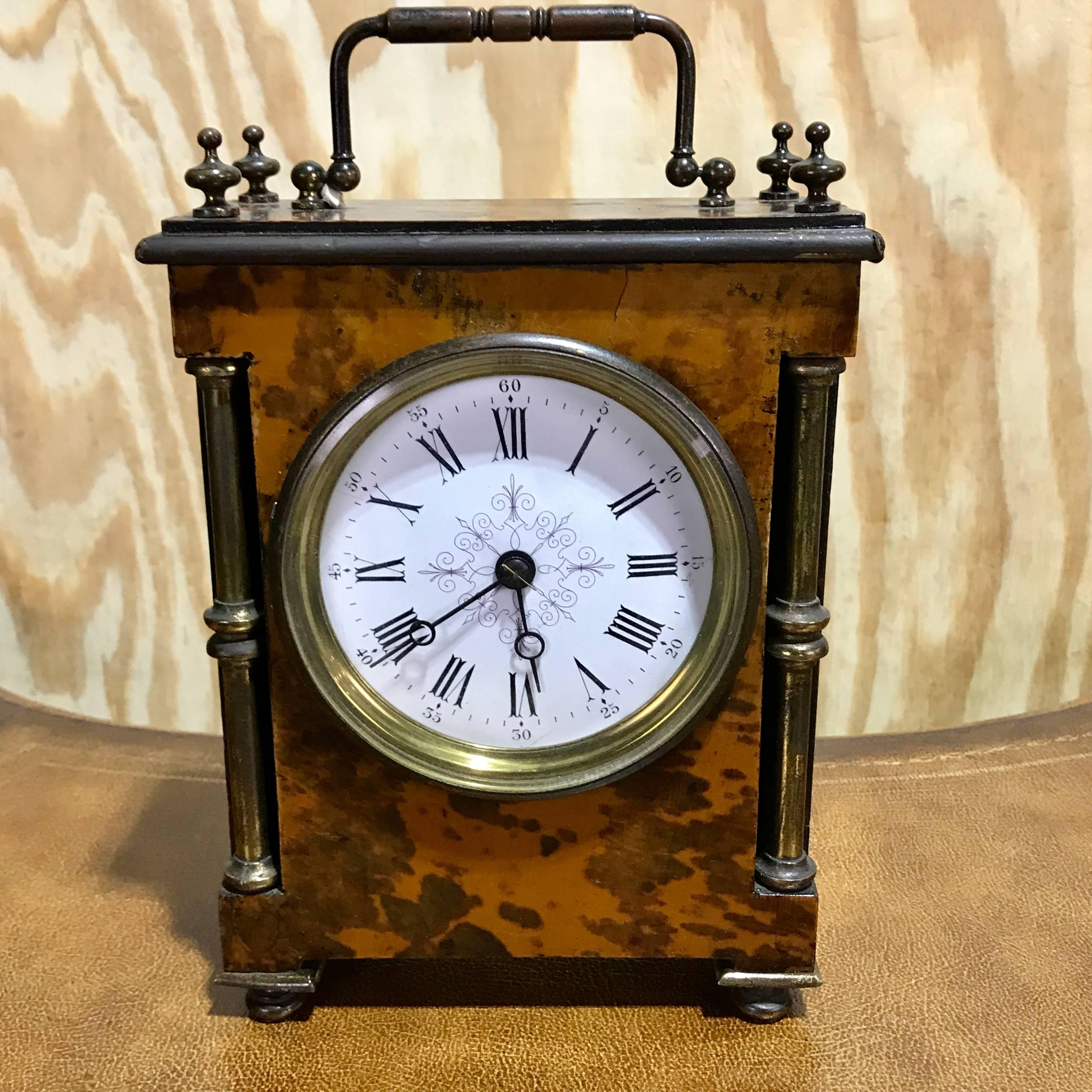 Antique English tortoiseshell bracket clock, keeps good time, complete with key.