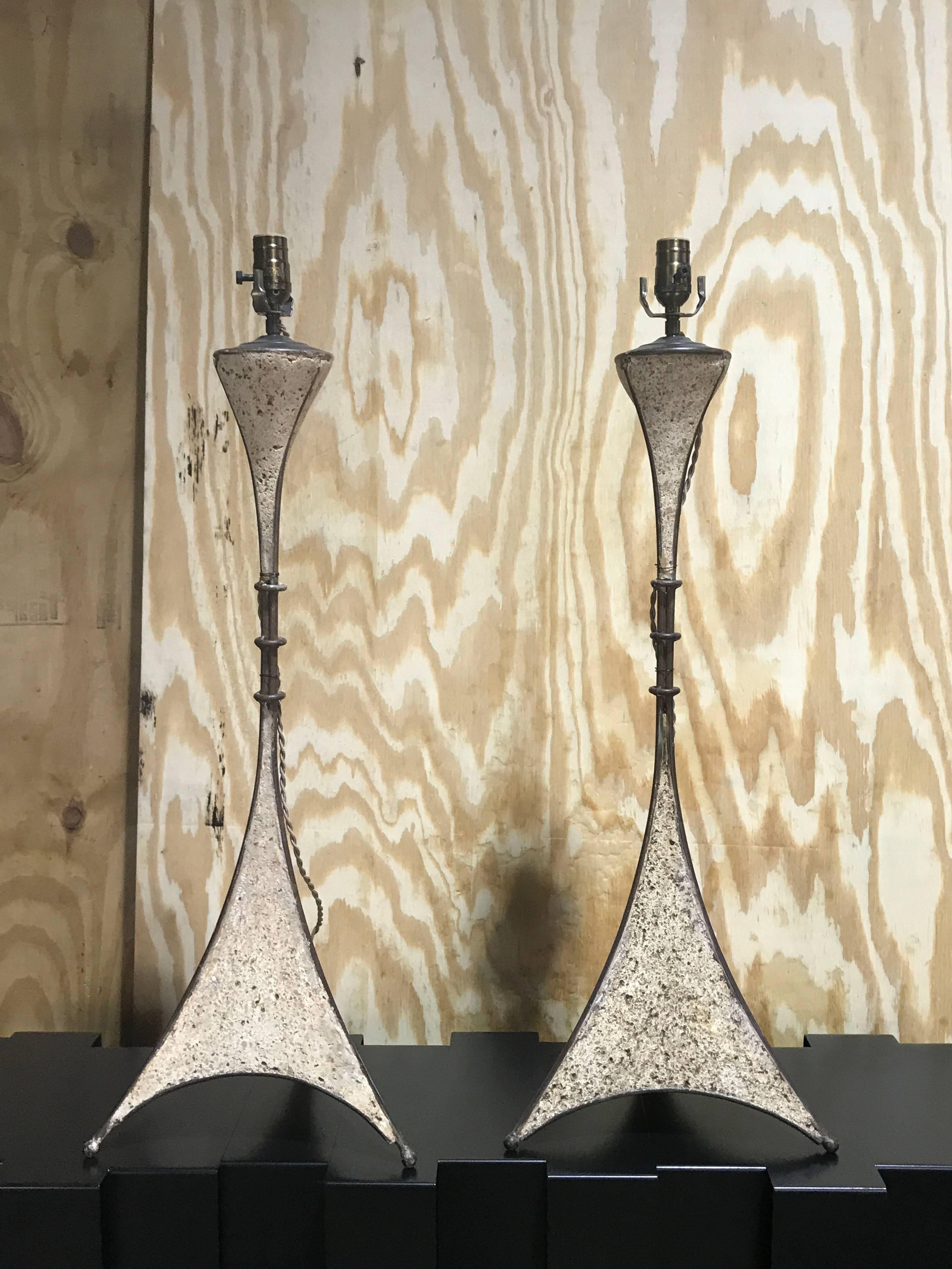 Pair of French modern cast stone and iron lamps, each one newly French wired
29