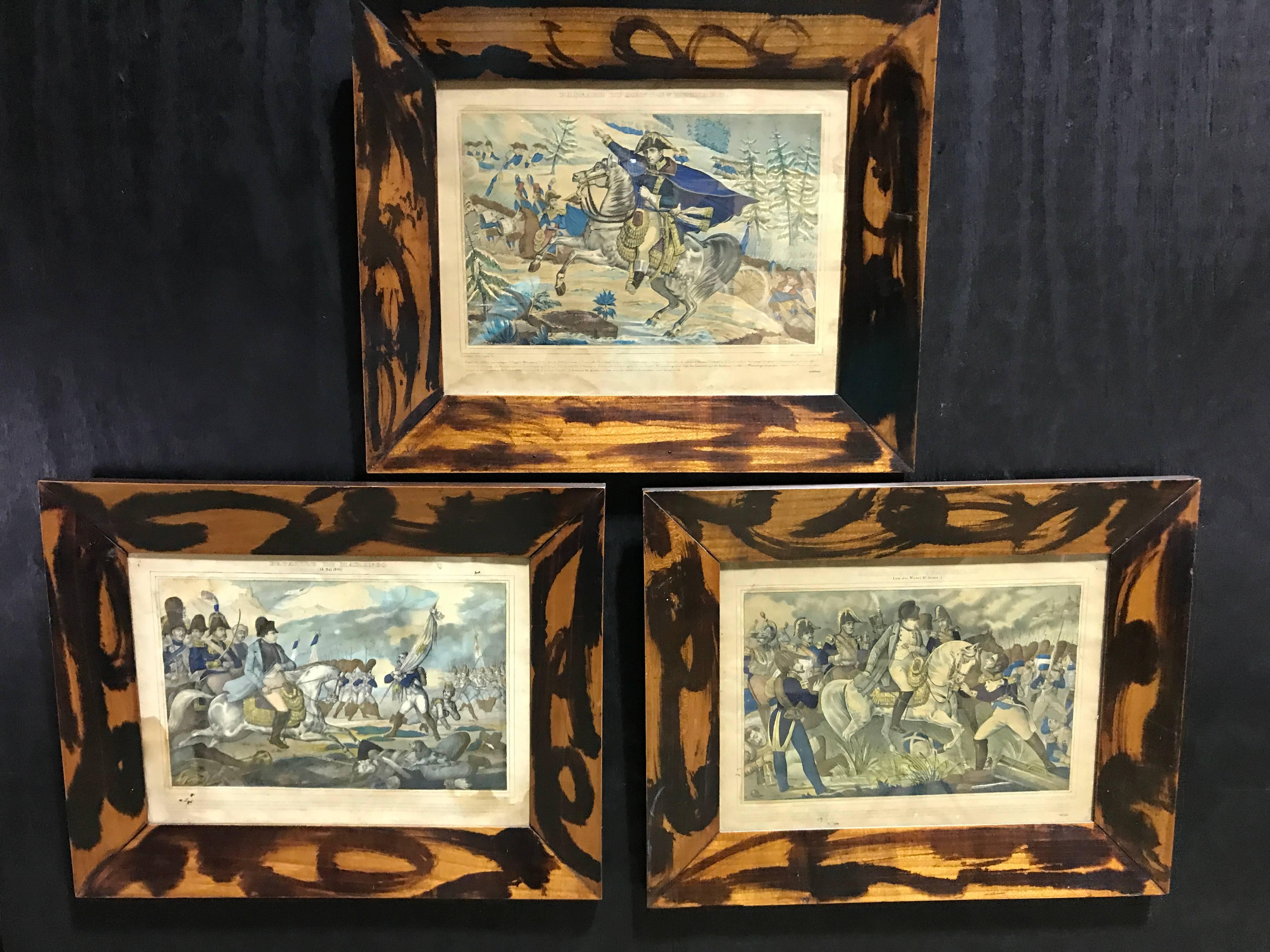 Three antique Napoleon war scene hand-colored prints, each one a different hand colored print of Napoleonic Battle Scenes, in superb faux painted tortoise antique frames, bearing Lockson import labels. Fresh from a Palm Beach Estate
Print 14