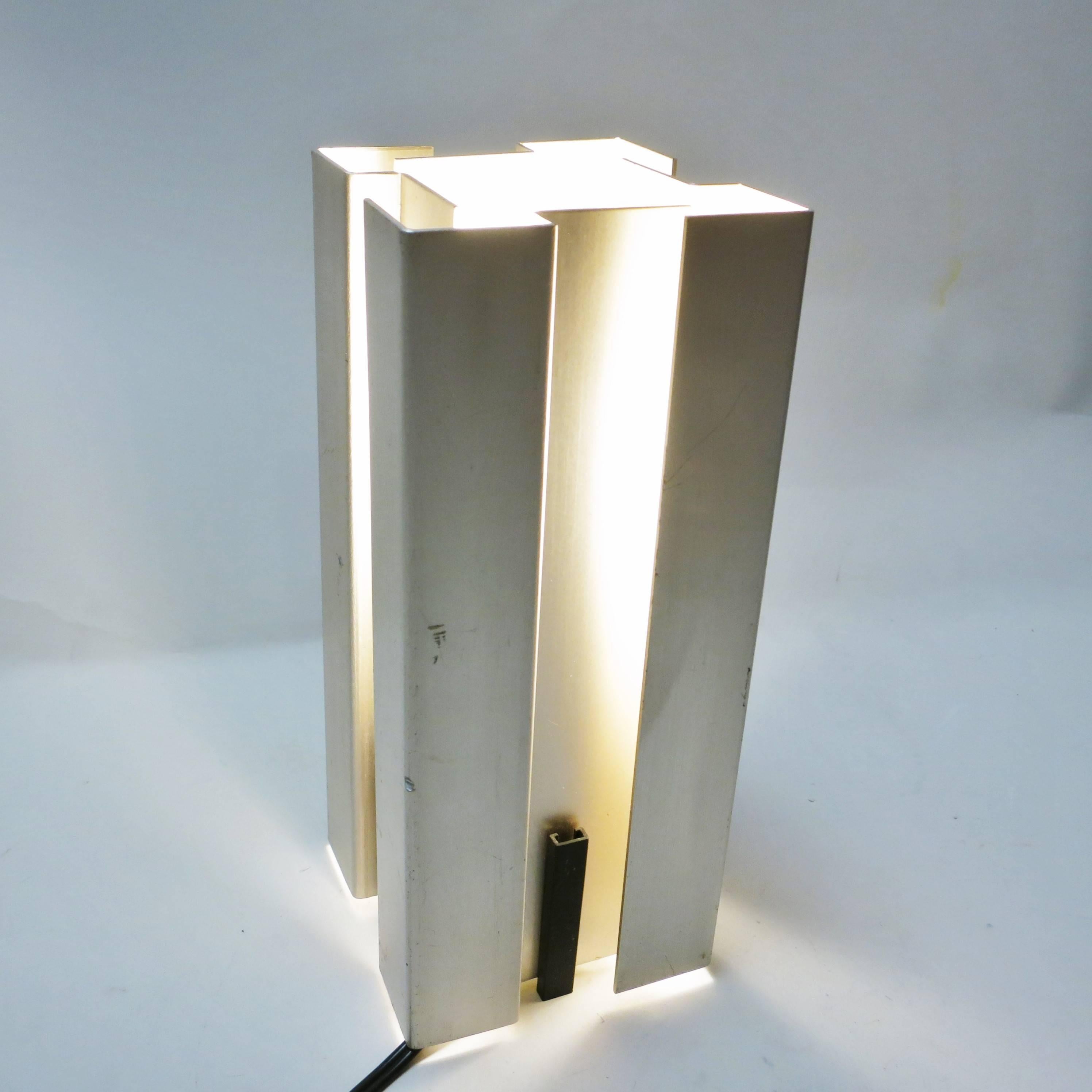 Scandinavian Mid-Century Modern lamp made of four sheet of aluminium, circa 1965.