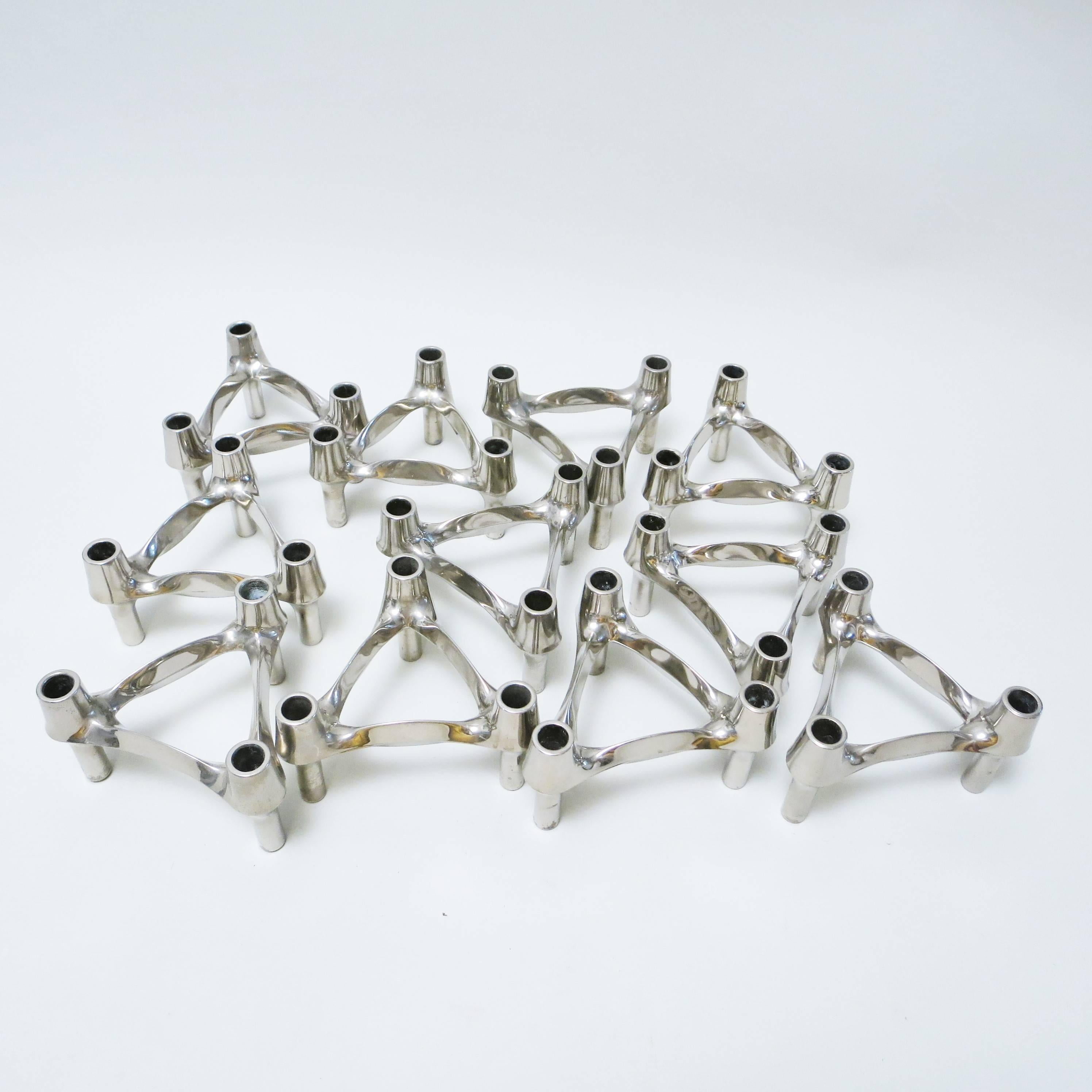 Original 1970s set of 11 Candleholder by Caesare Stoffi and Fritz Nagel for BMF, Nagel, Germany. 
A modular design, stackable and blendable candleholder to build sculptural objects in several kind of ways and dimensions. 
This item is in a very
