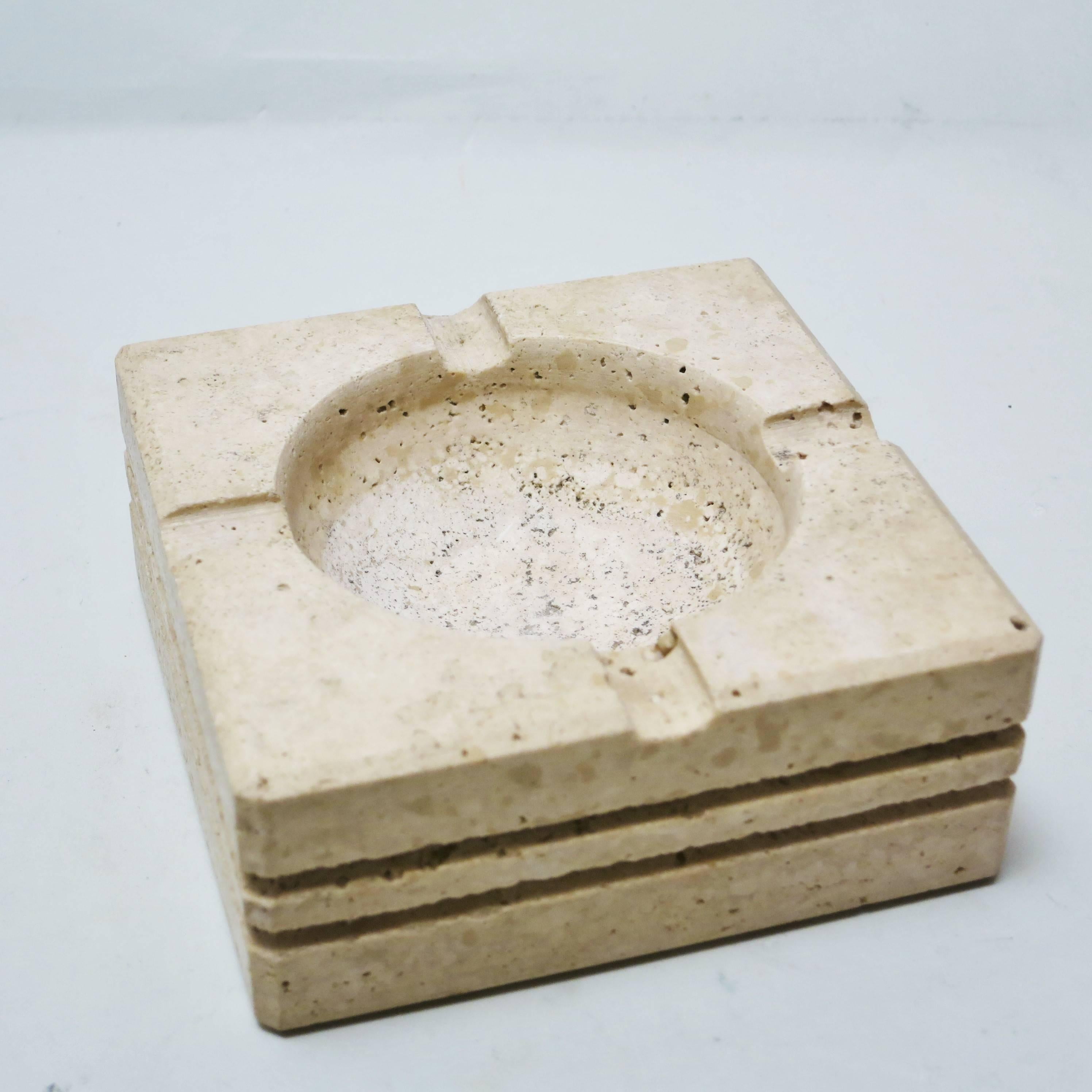 Midcentury Italian carved travertine ashtray or vide-poche by Flli Mannelli, circa 1970.