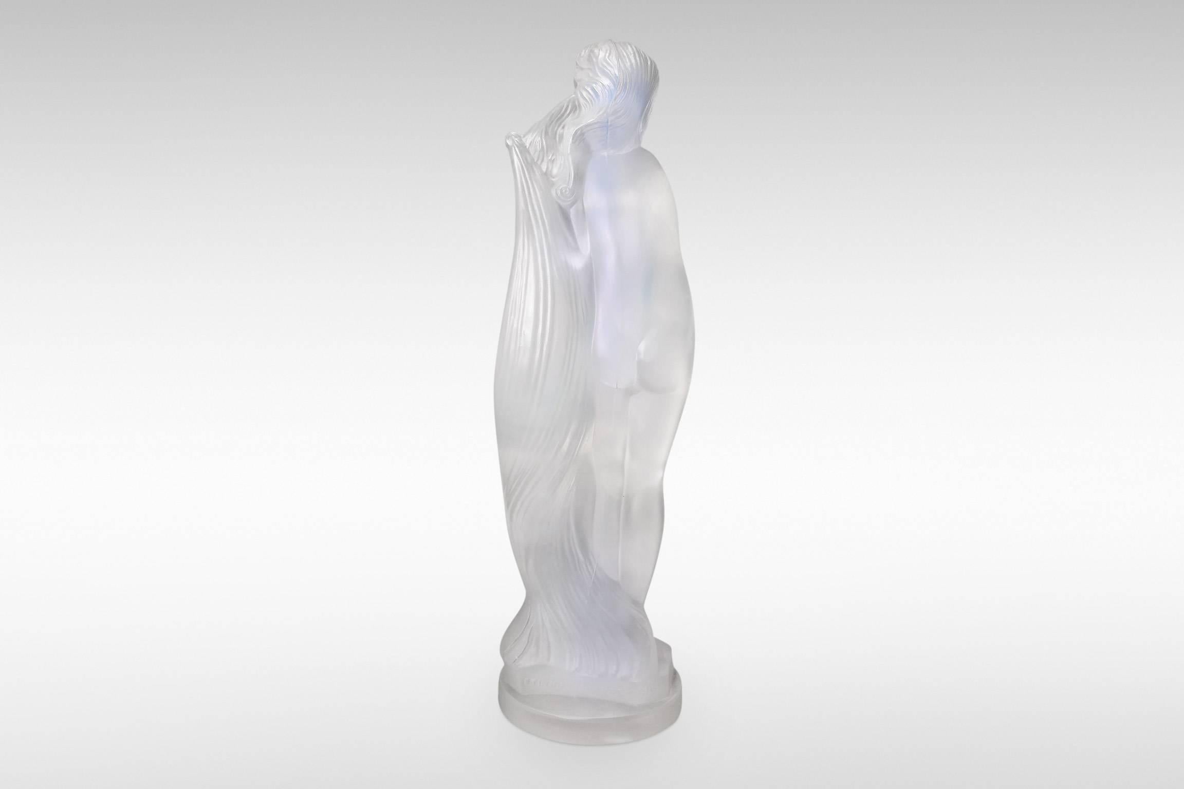 The Art Deco nude figurine 'Nu' by Lucile Sevin for Etling, Paris in opalescent glass.
Marked 'Etling France 86'
circa 1932.
