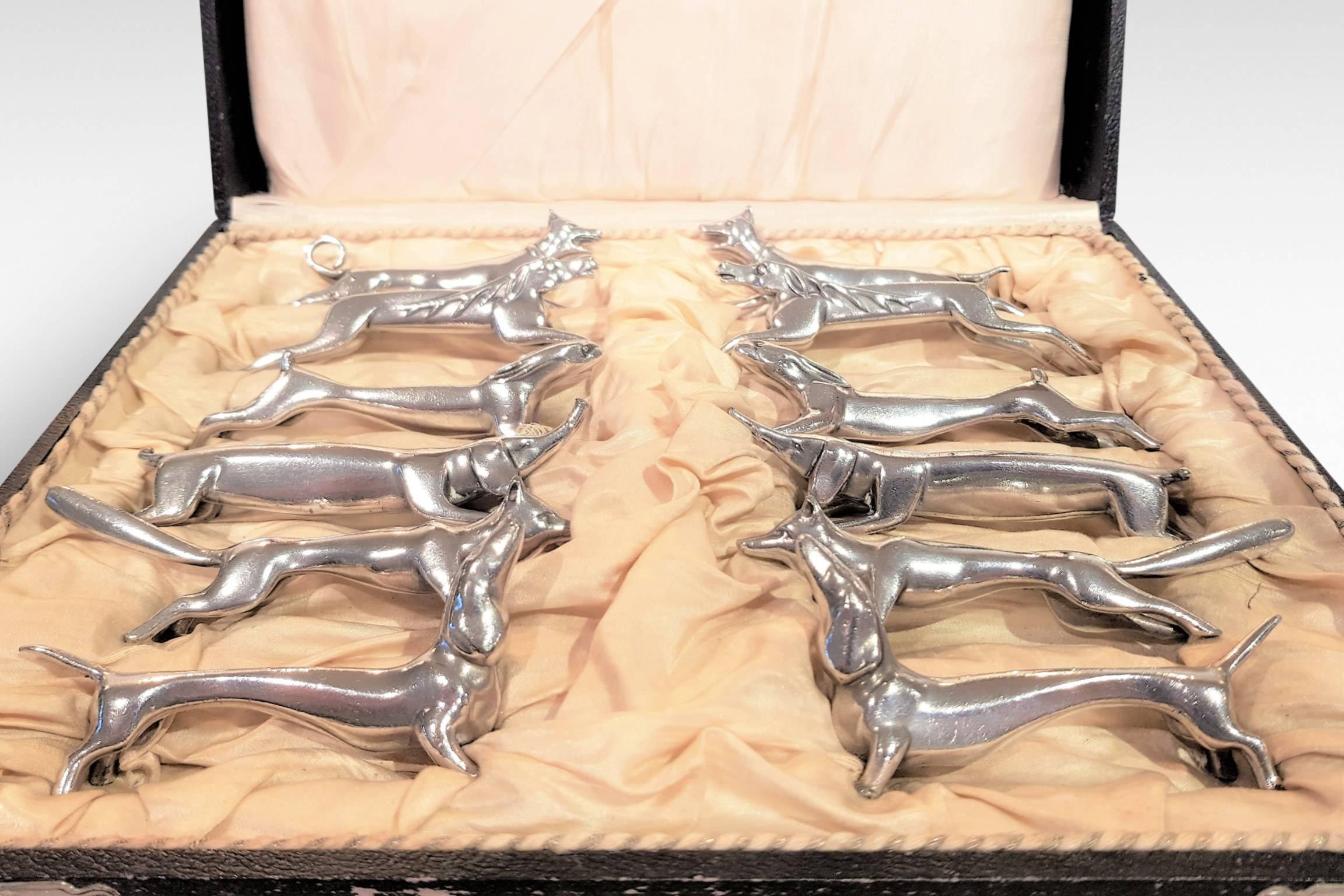 This a rare complete set in its original box of 12 hunting related knife rests featuring pairs of dogs, hounds, foxes, hares, stags and elephants,
circa 1909-1914, and retailed by Orfevrerie Miele & Co, Paris (see illustrations).
Each piece marked
