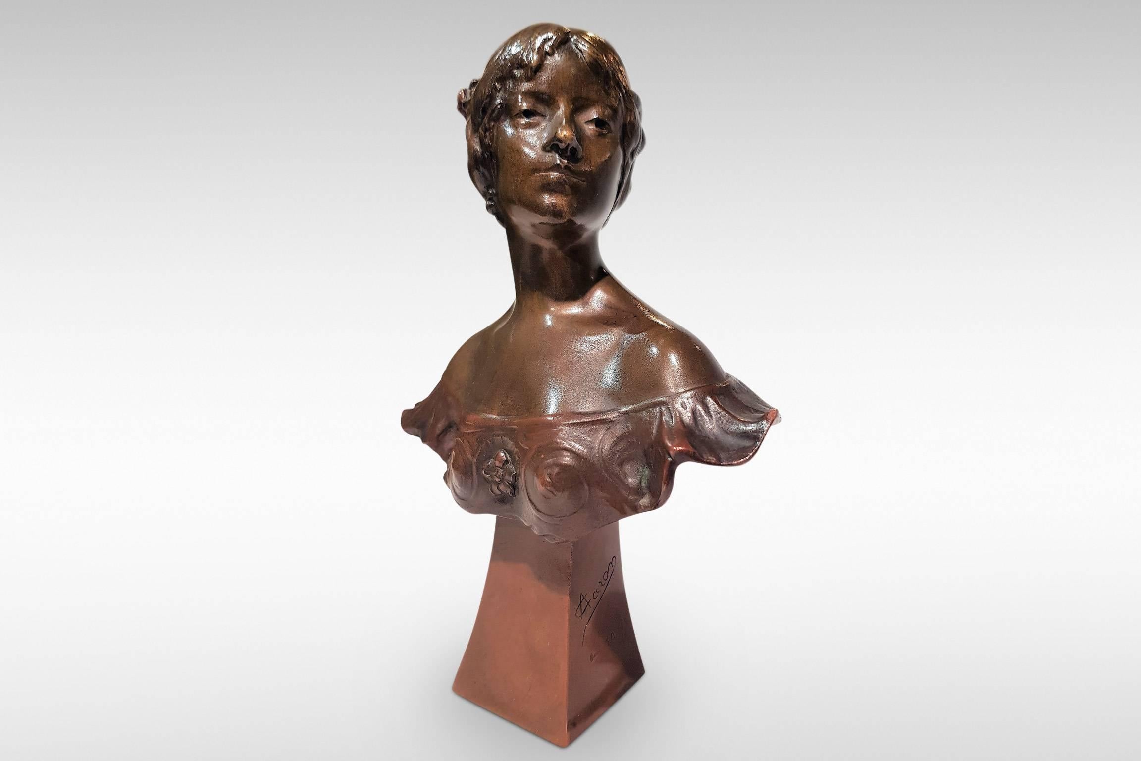 An Art Nouveau bronze bust by Alexandre Caron
circa 1930.