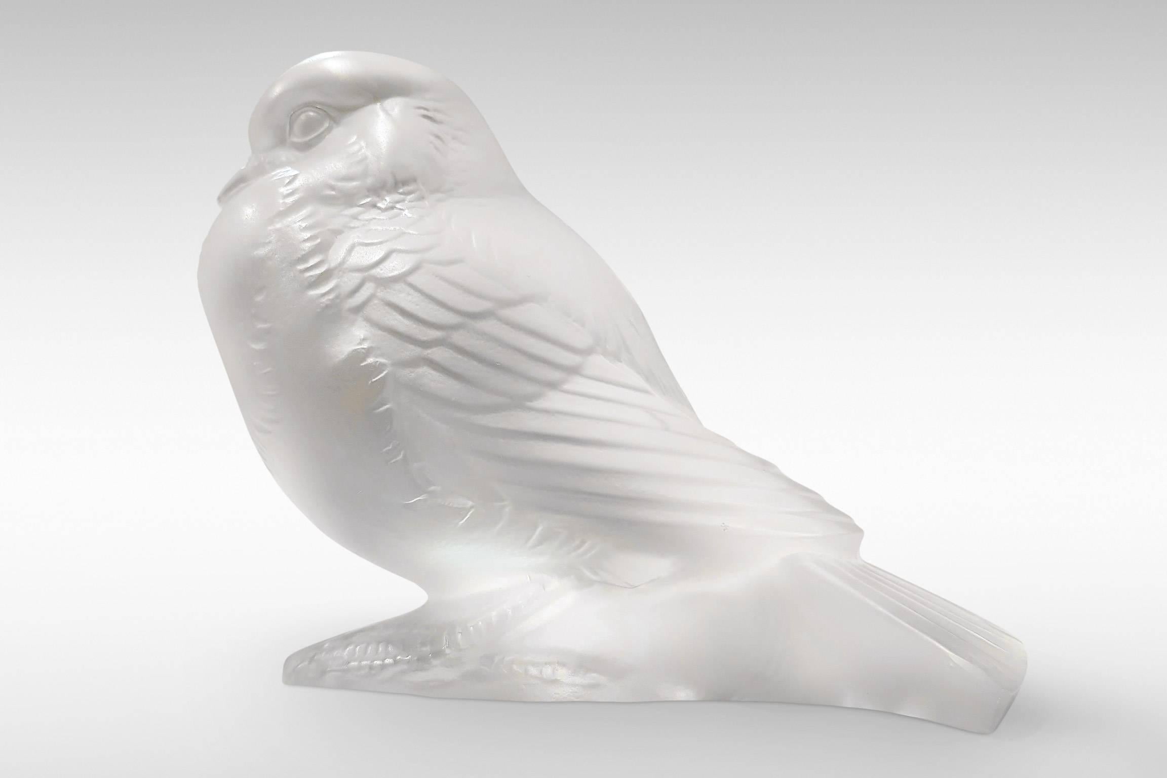 'Moineau au Fier' (Crouching Sparrow) is a charming sculpture in opalescent glass by Rene Lalique,
circa 1930.