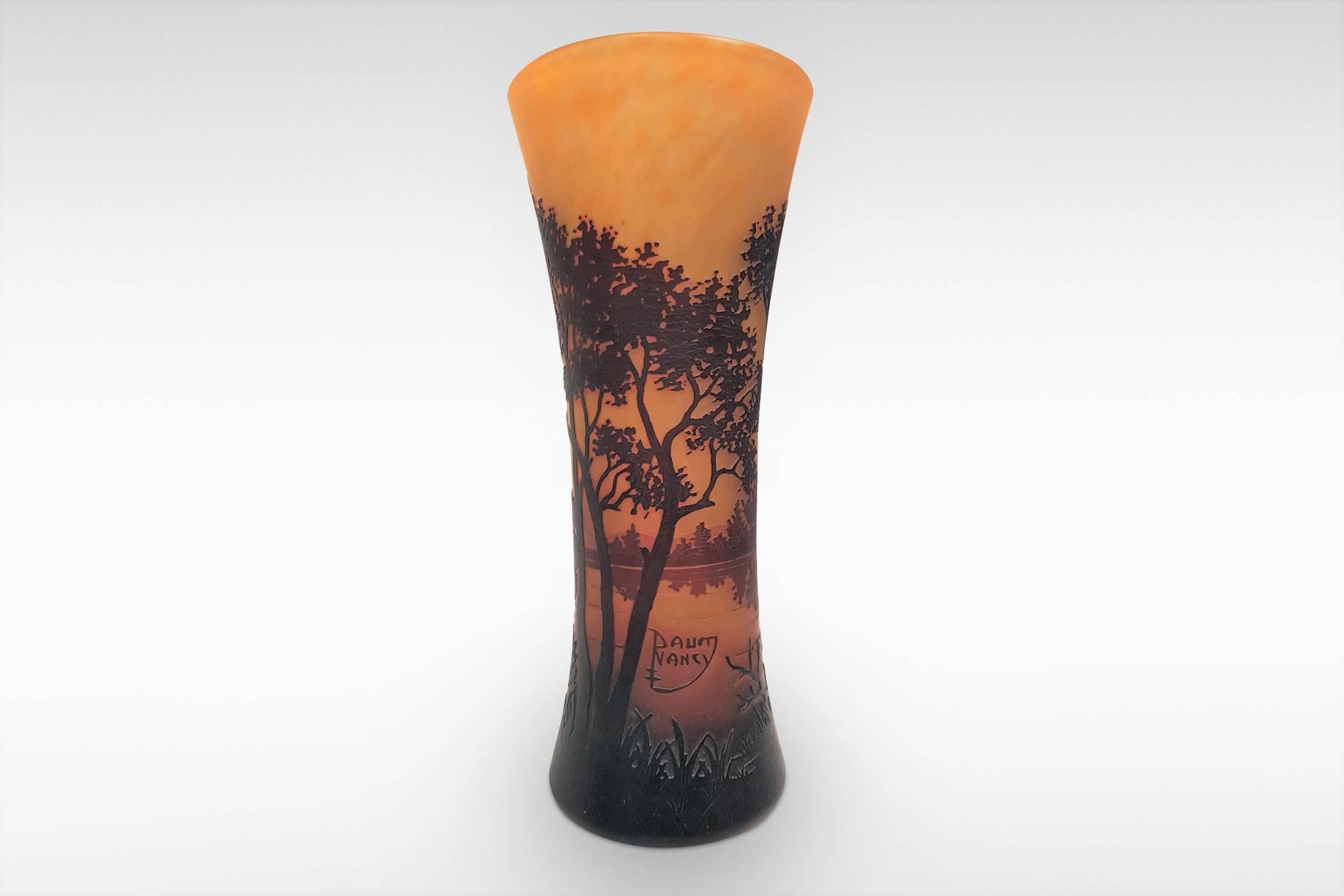 A wistful Art Nouveau forest scene created in cameo glass by Daum Freres, circa 1900.