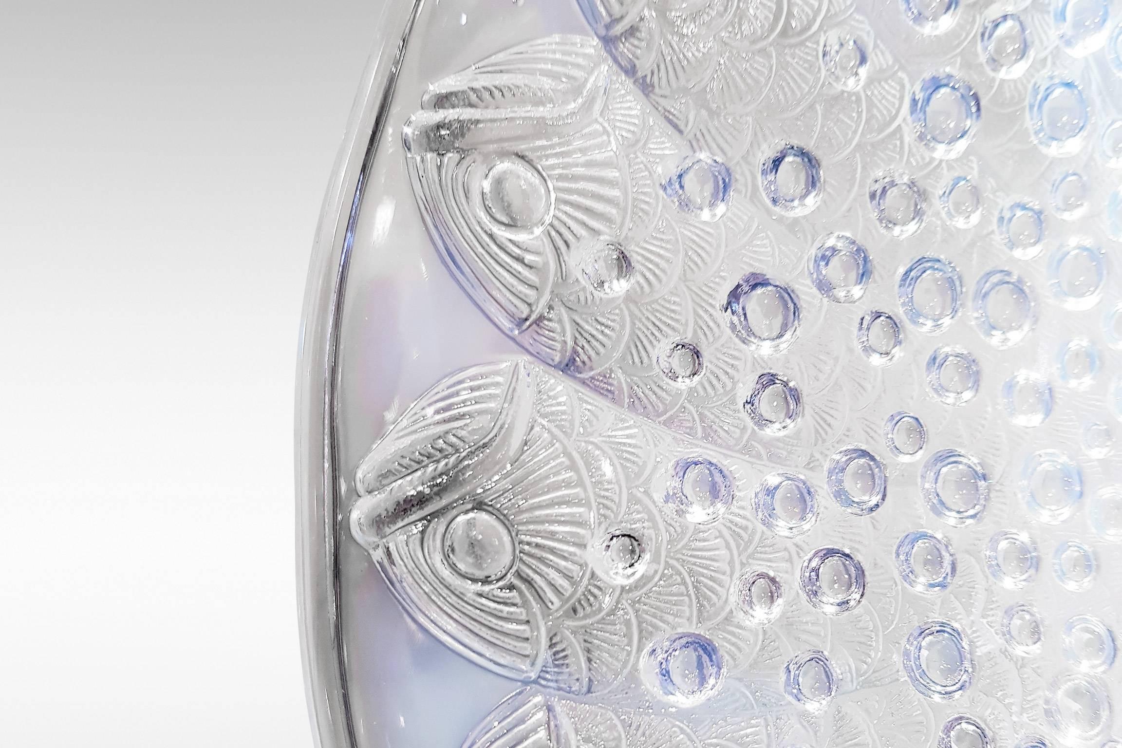A superb opalescent glass salver 'Roscoff' (Fish heads) by Rena Lalique.
Signed, circa 1930.