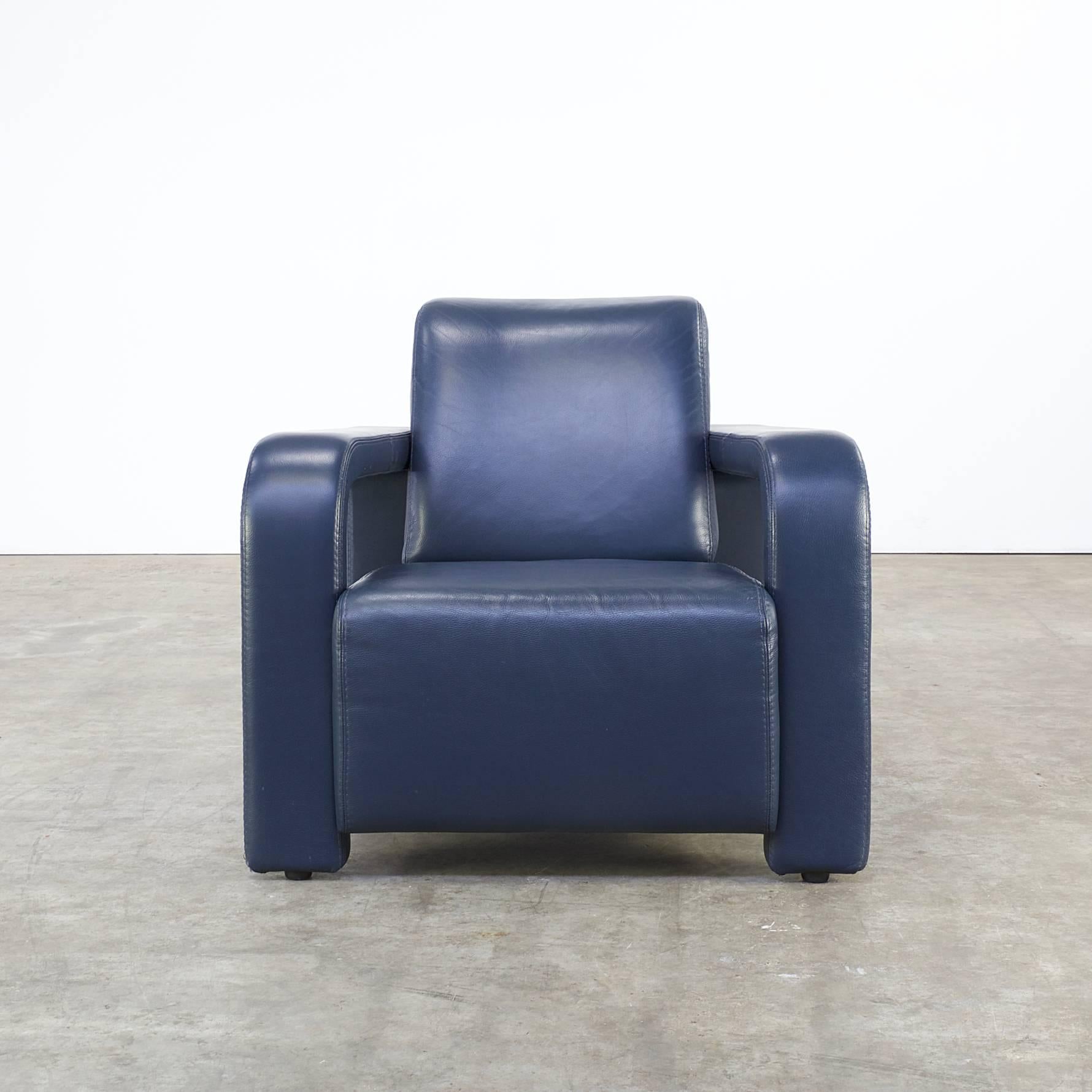 1980s lounge chair for Marinelli Italy. Blue skai/leatherette in good condition. Wear consistant with age and use. Very comfortable and high quality lounge chair. Dimensions: 86 cm (W) x 90cm (D) x 79cm (H), seat H 39cm.