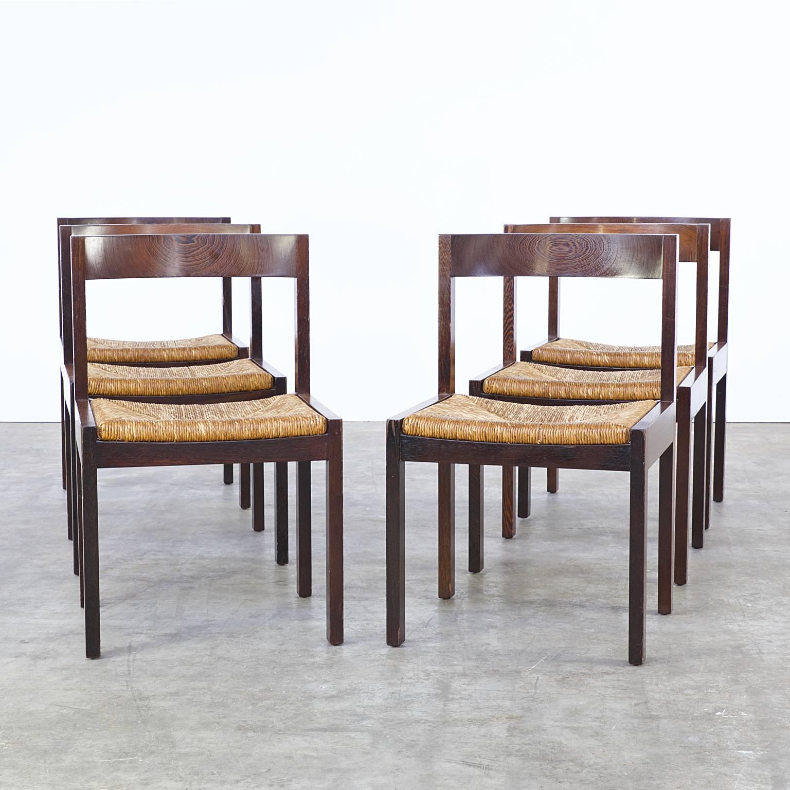 Set of six 1960s Martin Visser wengé dining chair for 't Spectrum. Wenge wood, wicker seating. Good condition, wear consistant with age and use. Dimensions: 48cm (W) x 48cm (D) x 76cm (H), seat 44cm.