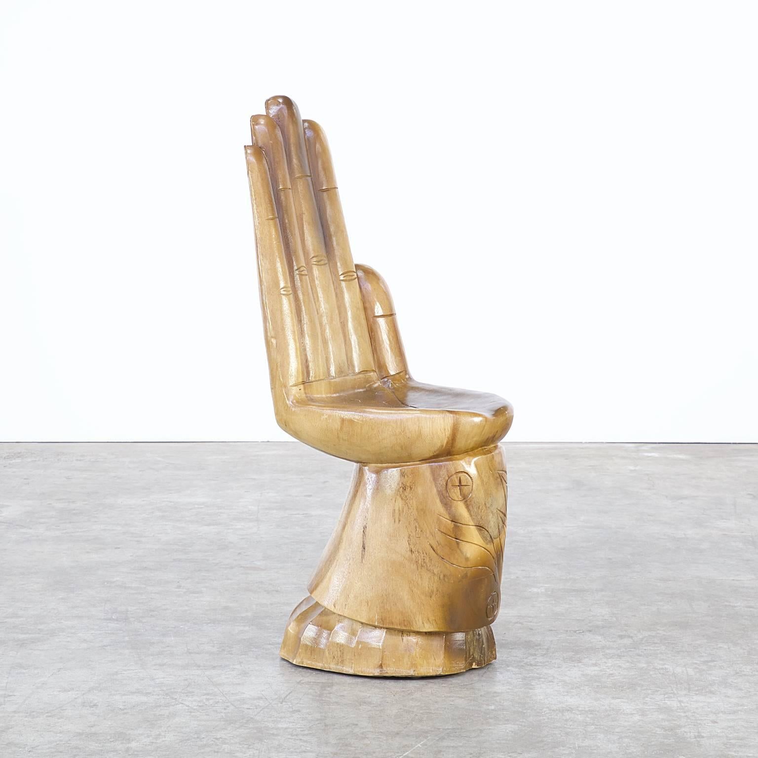 wooden hand shaped chair