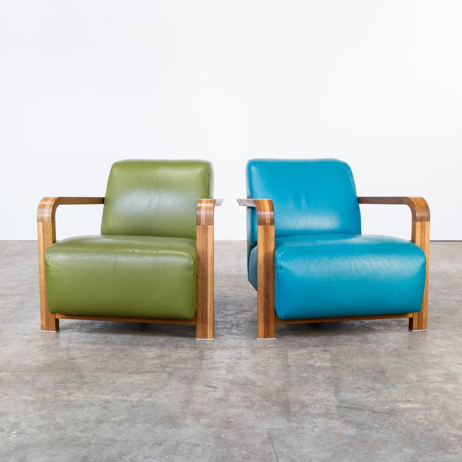 Set of two Hugo de Ruiter fauteuils ‘hemingway’ for Leolux. Designed 2003. Wapiti leather, masaimix wood.
Hugo de Ruiter named this design in 2003 “hemingway’. His philosophy: These lounge chairs need to be comfortable for long time sitting, it has