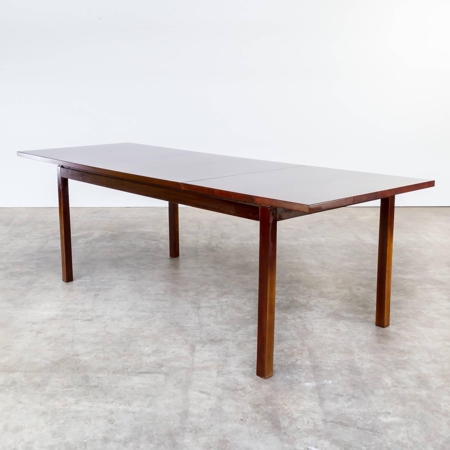 1970s Oswald Vermaercke rosewood dining table, extendable for V-form, Belgium. Beautiful and warm signing in the rosewood. Good condition, wear consistent with age and use. Dimensions: 168-240cm (W) x 90cm (D) x 75cm (H).
