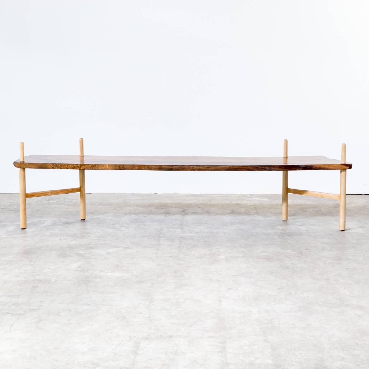 Beautiful walnut bench in the style of George Nakashima. Very good and firm condition. Dimensions: 222cm (W) x 39cm (D) x 60cm (H) seat h 45.5cm.