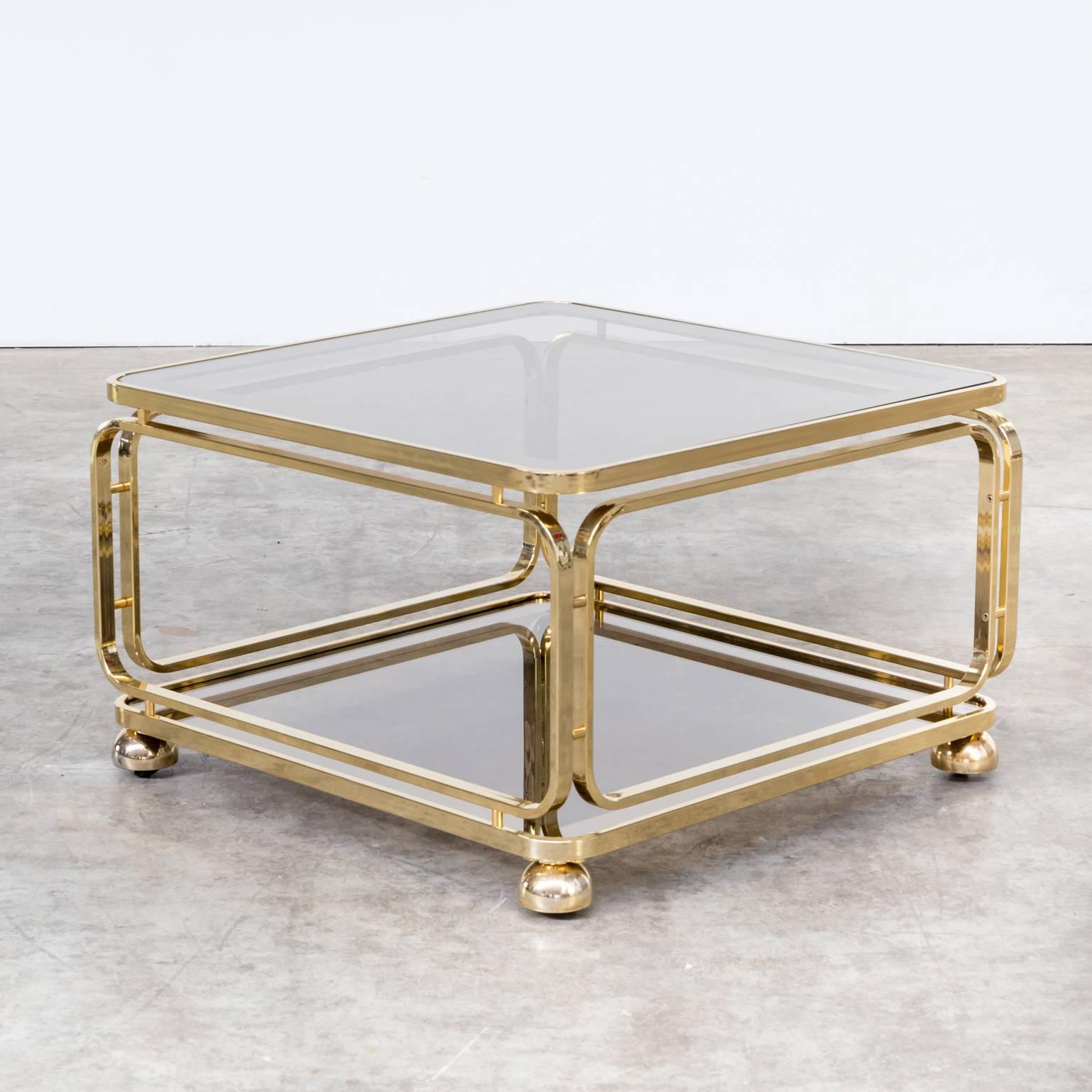 1960s brass and glass coffee table, side table for Allegri. Darkend glass, polished brass framing. Table is in good condition, wear consistant with age and use. Nice patina on the glass. Original signed Allegri.