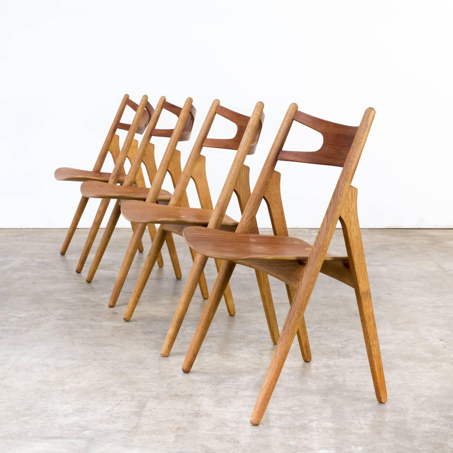 One set of four Hans Wegner ‘CH29 Sawback’ dining chairs for Carl Hansen & Son. Beautiful iconic designed CH29 set, partly restored. Good condition wear consistent with age and use.