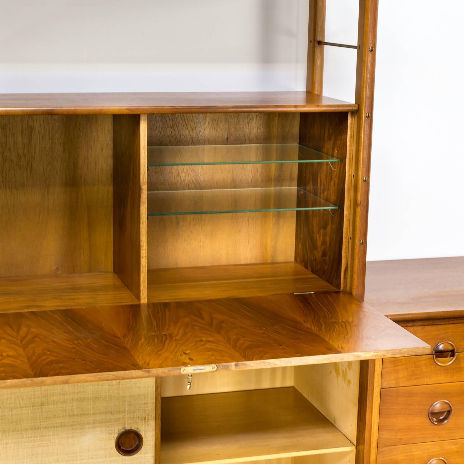 1960s William Watting sideboard for Fristho. Special rare design sideboard existing in one low sideboard and 1 top element. Beautiful condition with linen structured sliding doors.