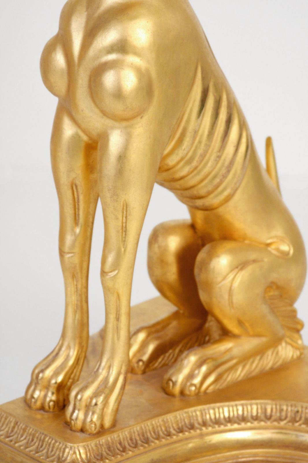 Indonesian Pair of Water Gilded Life Size Dogs For Sale