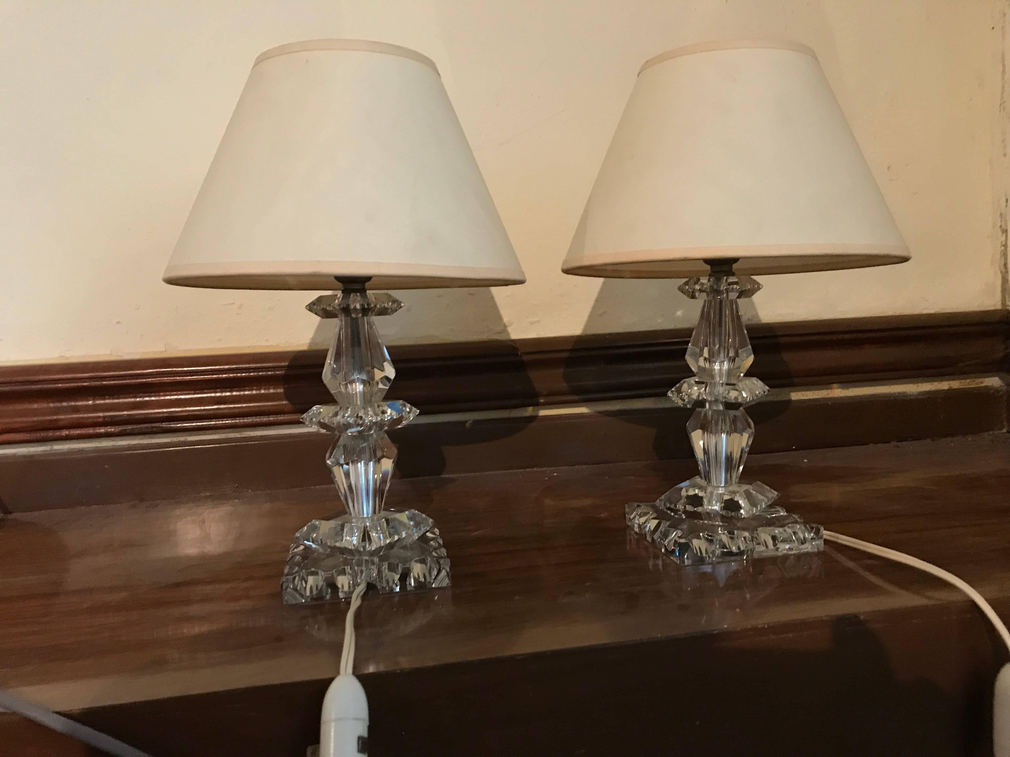 Beautiful pair of table lamps by Baccarat, France in hand cut Lead glass, circa 1940
Both of the lamps are in great condition with no chips or breaks and both signed with the ´Baccarat´ acid etched mark.
Lampshade’s are not included. 
Measurements