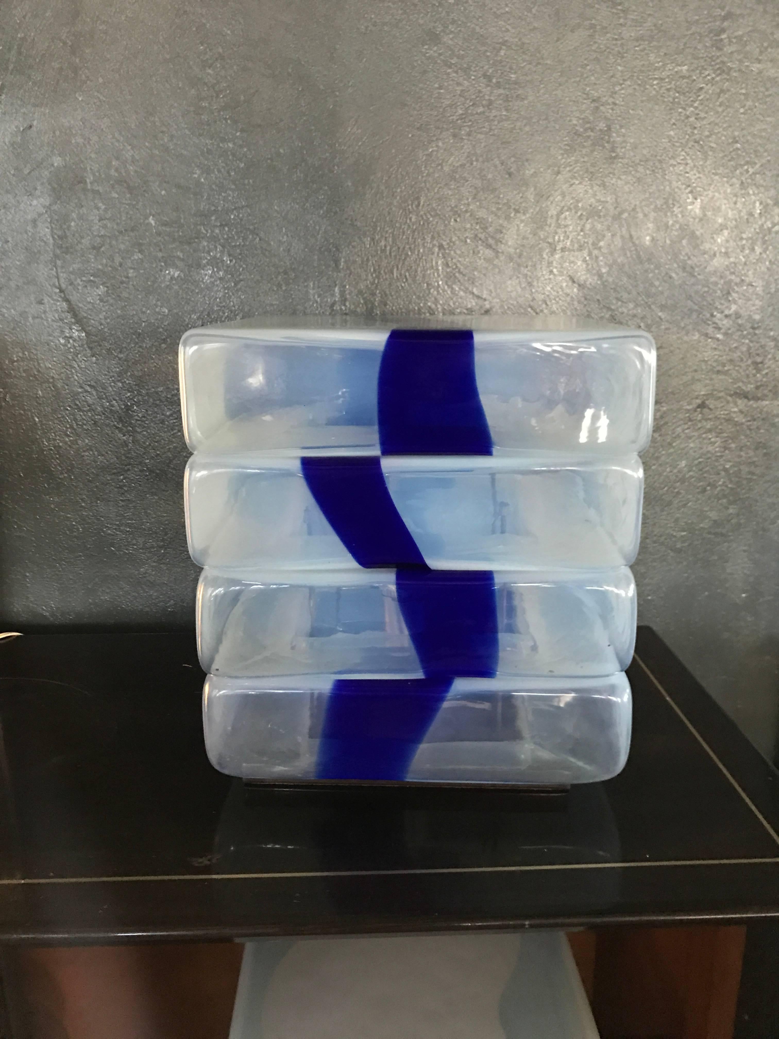 Beautiful Mid-Century Modern table lamp by Mazzega, designed by Carlo Nason, circa 1960, in blown Murano glass
The lamp alone measures 12.5 inches tall by 12 inches deep and wide.
Consists of four separate pieces stacked together.
We have 2 of this
