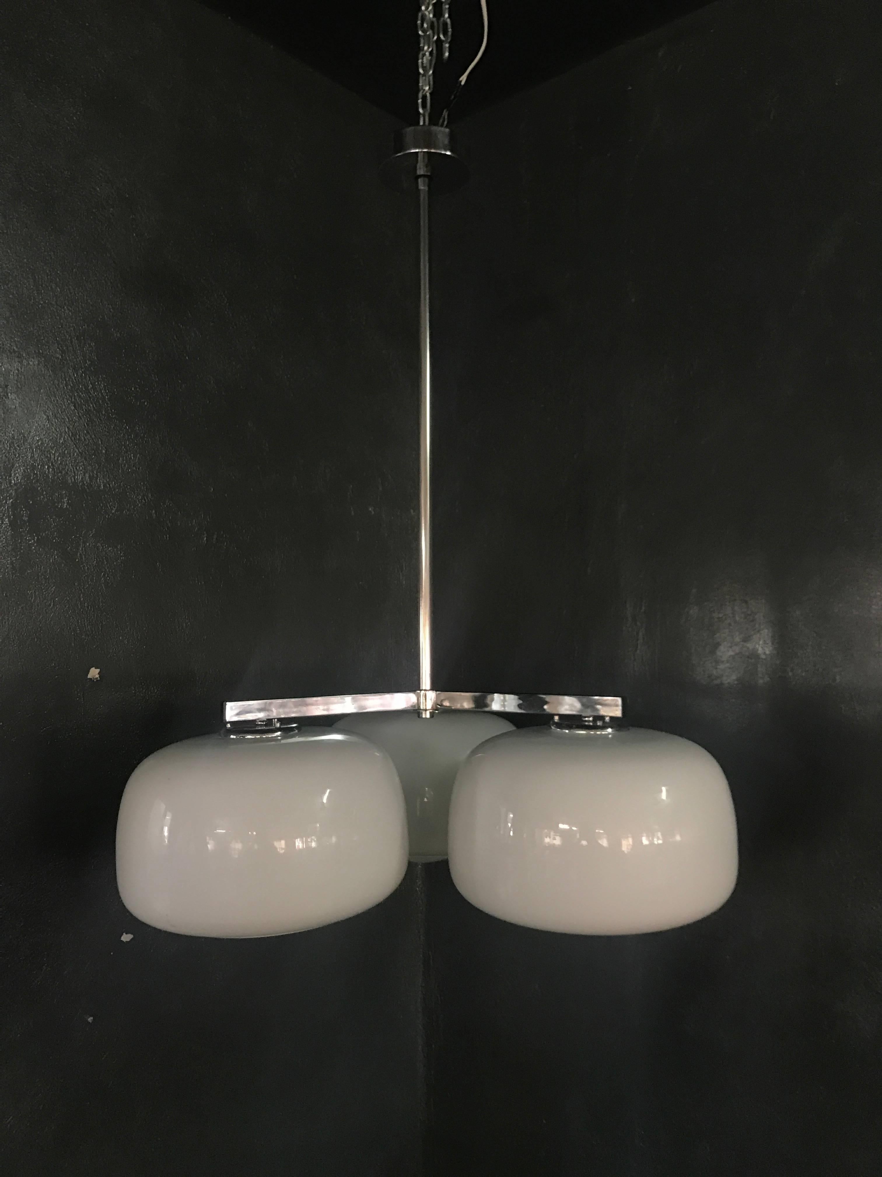 Beautiful Mid-Century Modern Italian chandelier in opaline glass and chrome, contemporary and in the style of the famous Omega series by Vico Magistretti for Artemide.